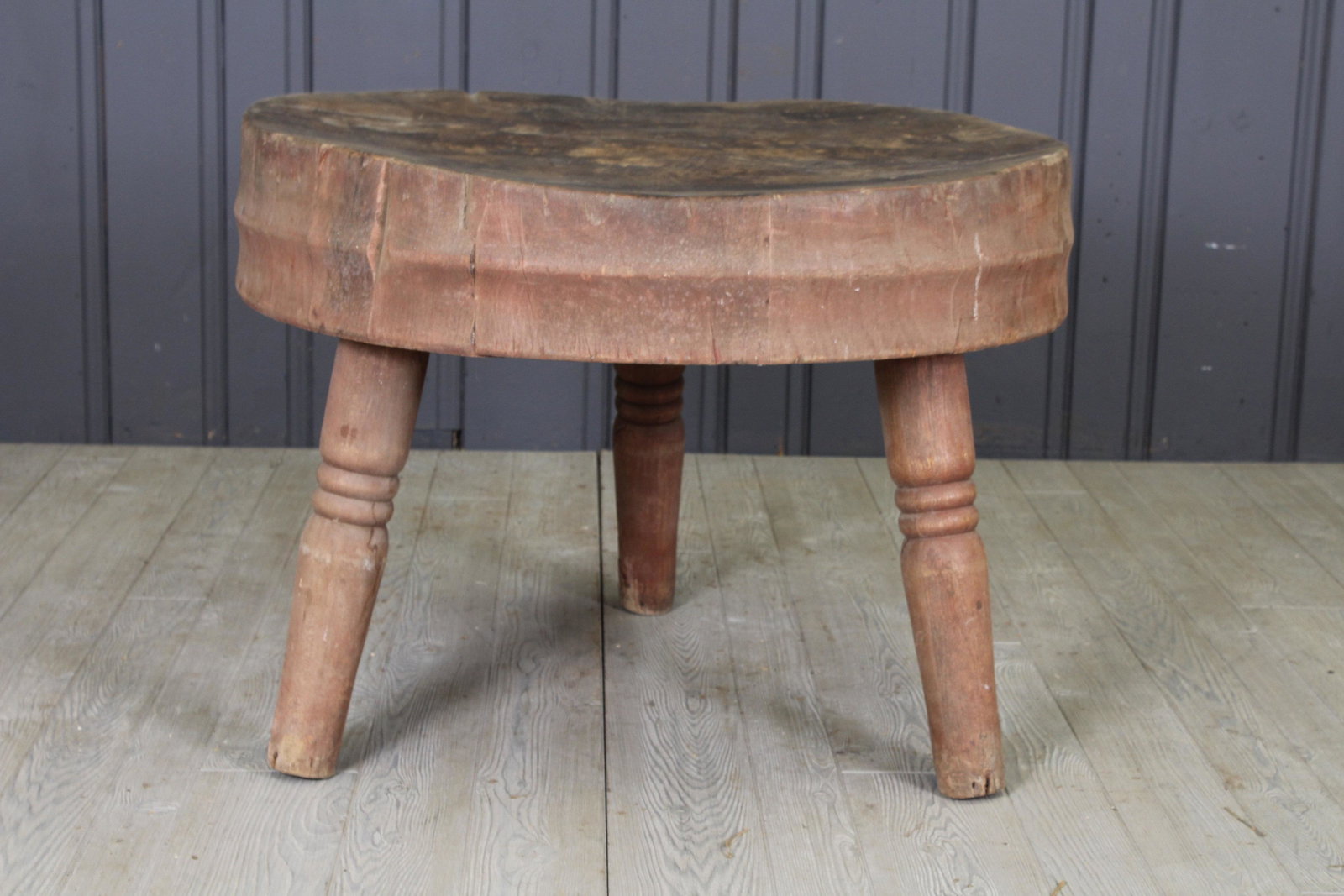 Circular Butcher Block: A good late 19th century carved and painted wood circular chopping block with turned legs. Size: 24.5"H x 33" dia.