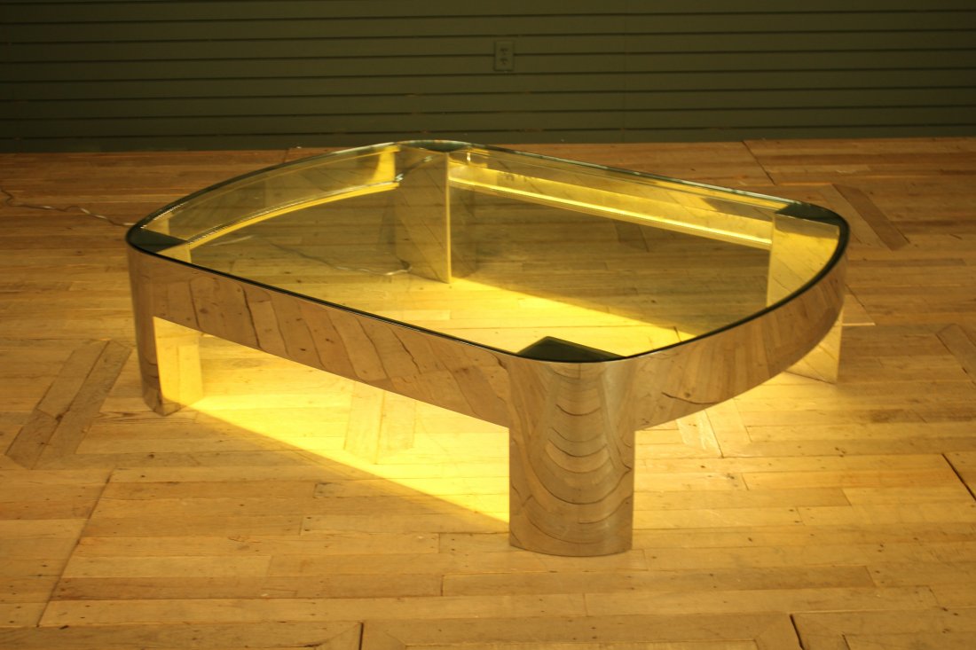 Chrome and Glass Coffee Table Attributed to Pace: Chrome and Glass Coffee Table Attributed to Pace, having an oval from and great scale. Electrified. Size: 16" H x 64" W x 48" D.