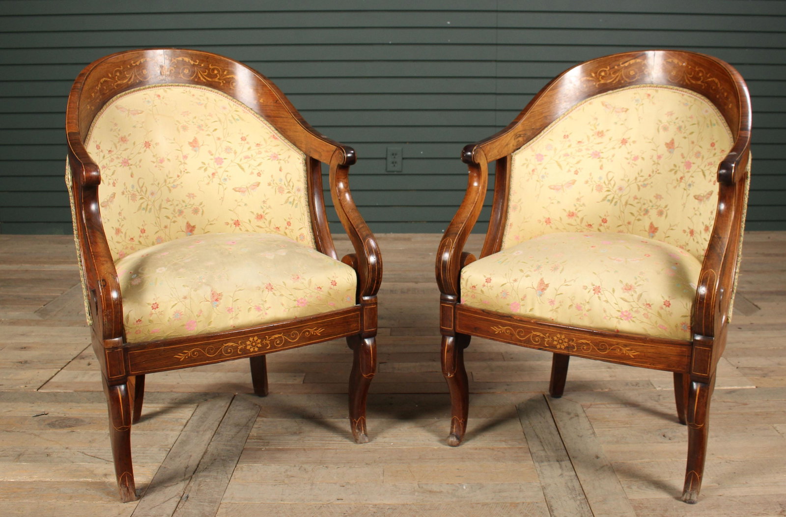 Pair of Edwardian Rosewood & Satinwood Arm Chairs: Pair of Edwardian Rosewood & Satinwood Arm Chairs, late 19th C. barrel back armchairs, each having marquetry inlaid crest rail and downswept arms with scroll decorated supports all raised on cabriole 