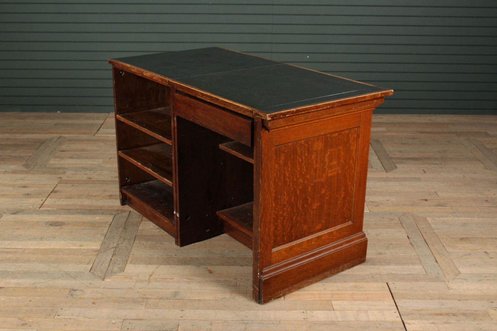 Turn of the Century 2-Part Oak Counter: Turn of the Century 2-Part Oak Counter having an inset top over a single drawer and open shelves. Size: 32.5" H x 51.5" W x 27" D.