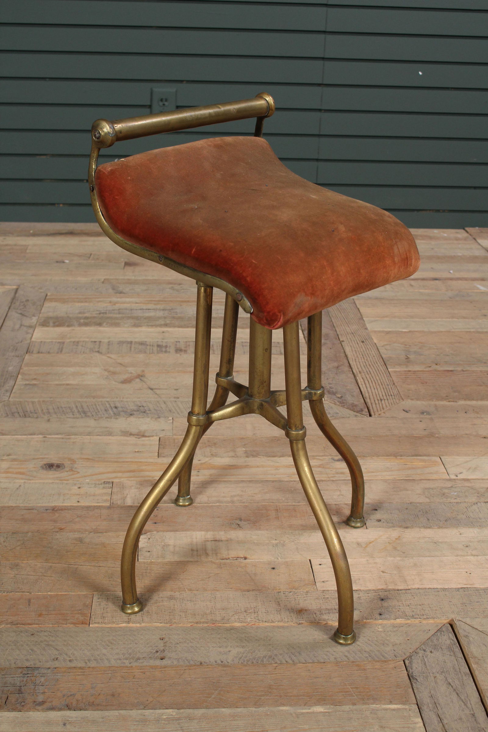 French Early to Mid 20th Century Brass Stool: French Early to Mid 20th Century Brass Stool having velvet upholstered revolving seat supported on shaped legs. Size: 24" H x 12" W x 12" D.
