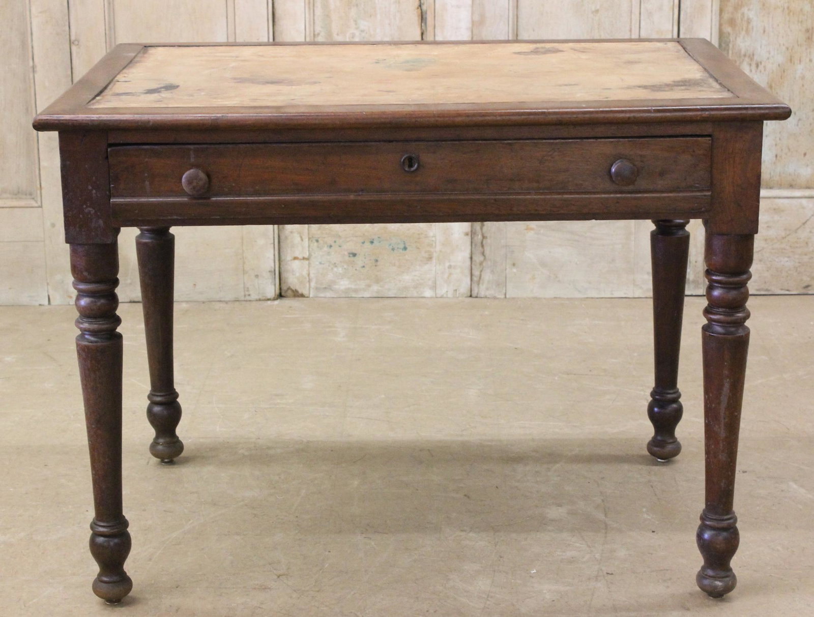 19th C English Writing Table: A 19th C. English Country writing desk having two drawers and turned legs missing leather top. Size: 30.5" H x 42" W x 29.5" D