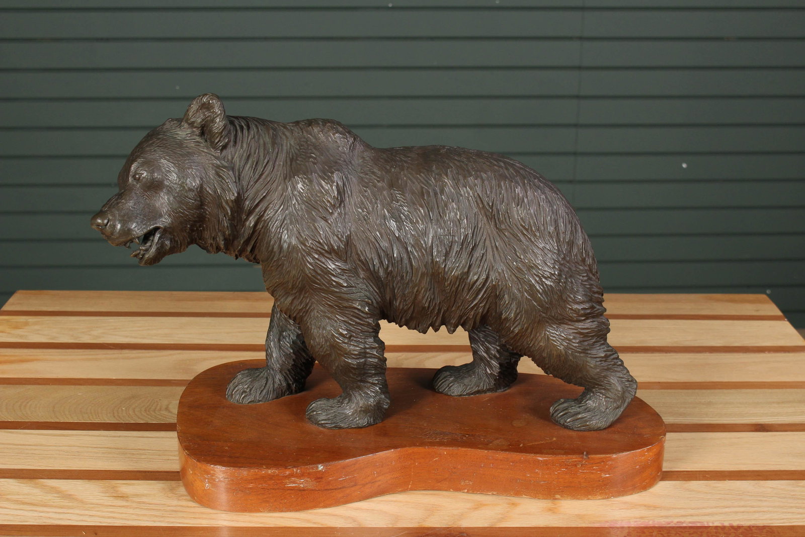 Well Executed Bronze Sculpture of a Walking Bear: Well Executed Bronze Sculpture of a Walking Bear possibly a Grizzly bear, mounted on wood base. Size: 13" H x 16.5" W x 9" D.