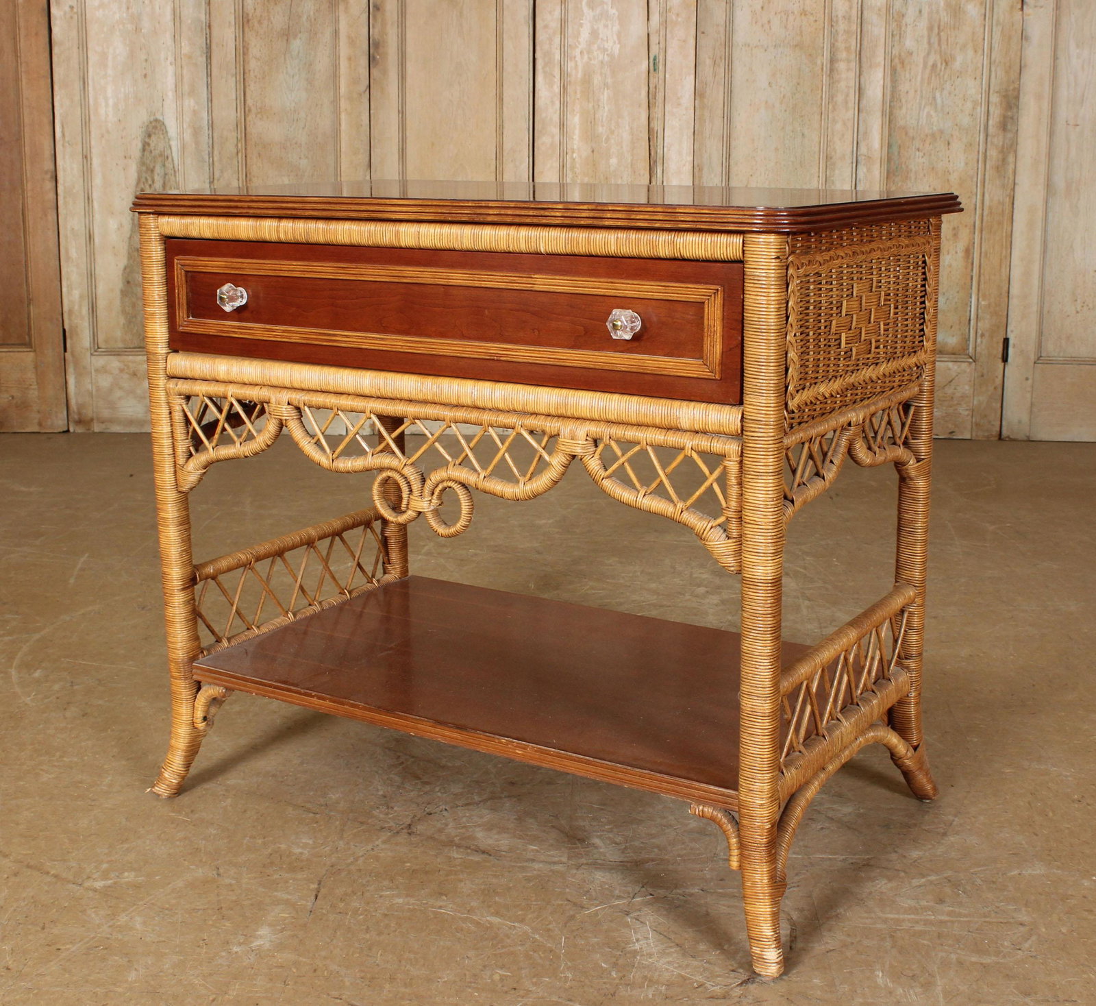 Henry Link Lexington Wicker Console: Henry Link Lexington Wicker Console, labeled, single drawer having lower shelf, marked Wicker Henry Link, Lexington, 435-520 Console. 33.5" H x 38.75" W x 22.75" D