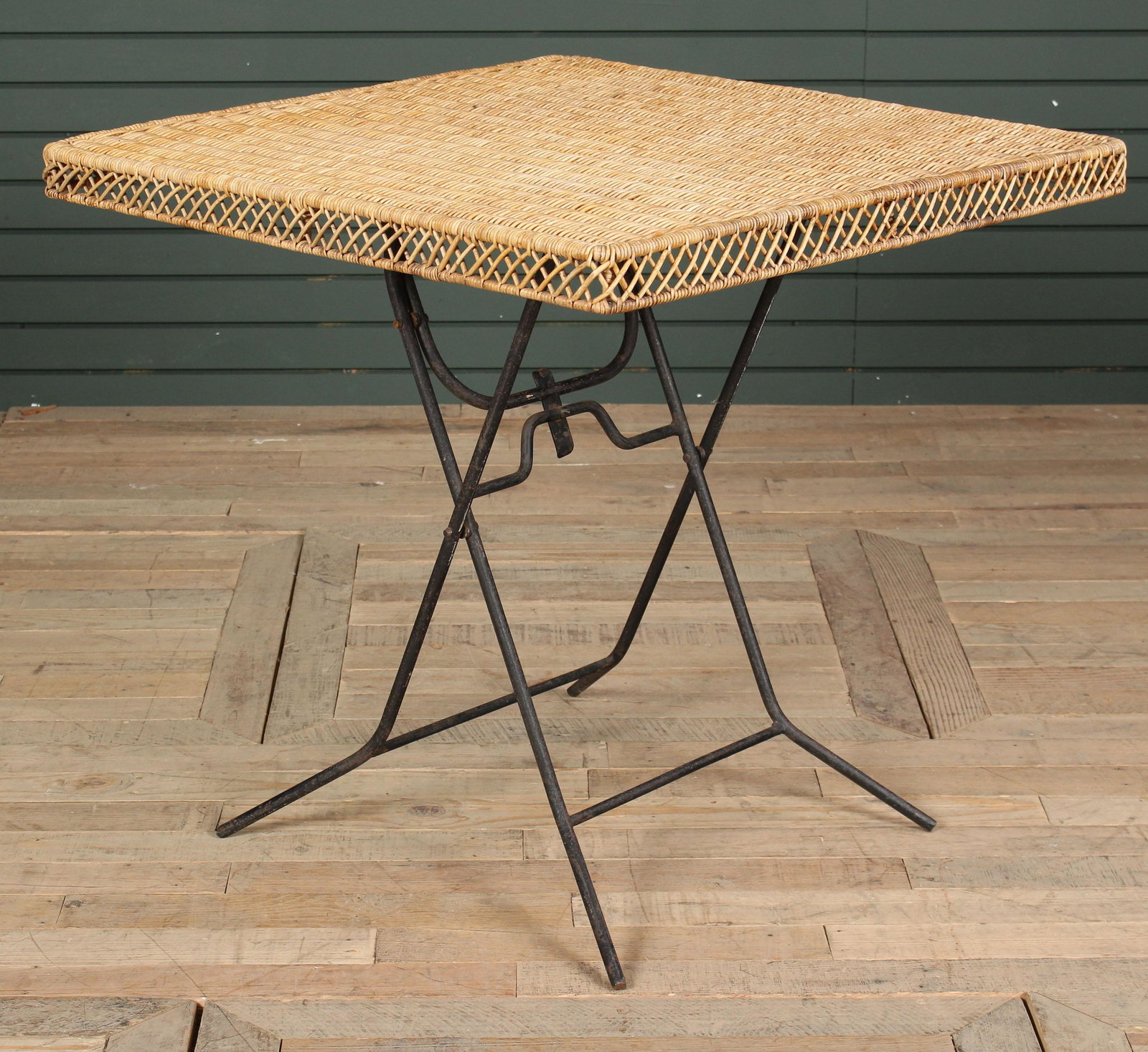 Wicker & Wrought Iron Folding/ Campaign Table: Stylish wicker and wrought iron folding/ campaign style garden or conservatory table. Size: 29.5" H x 30" W x 30" D.
