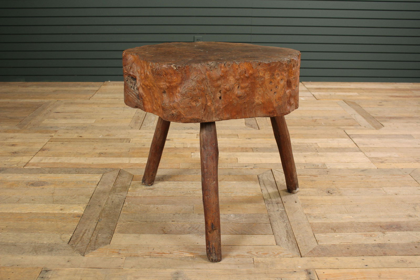 Burl Chopping Block Side Table: Burl Chopping Block Side Table with tree edge stump supported on legs. Size: Natural shape: 26" H x 24" W x 23" D.