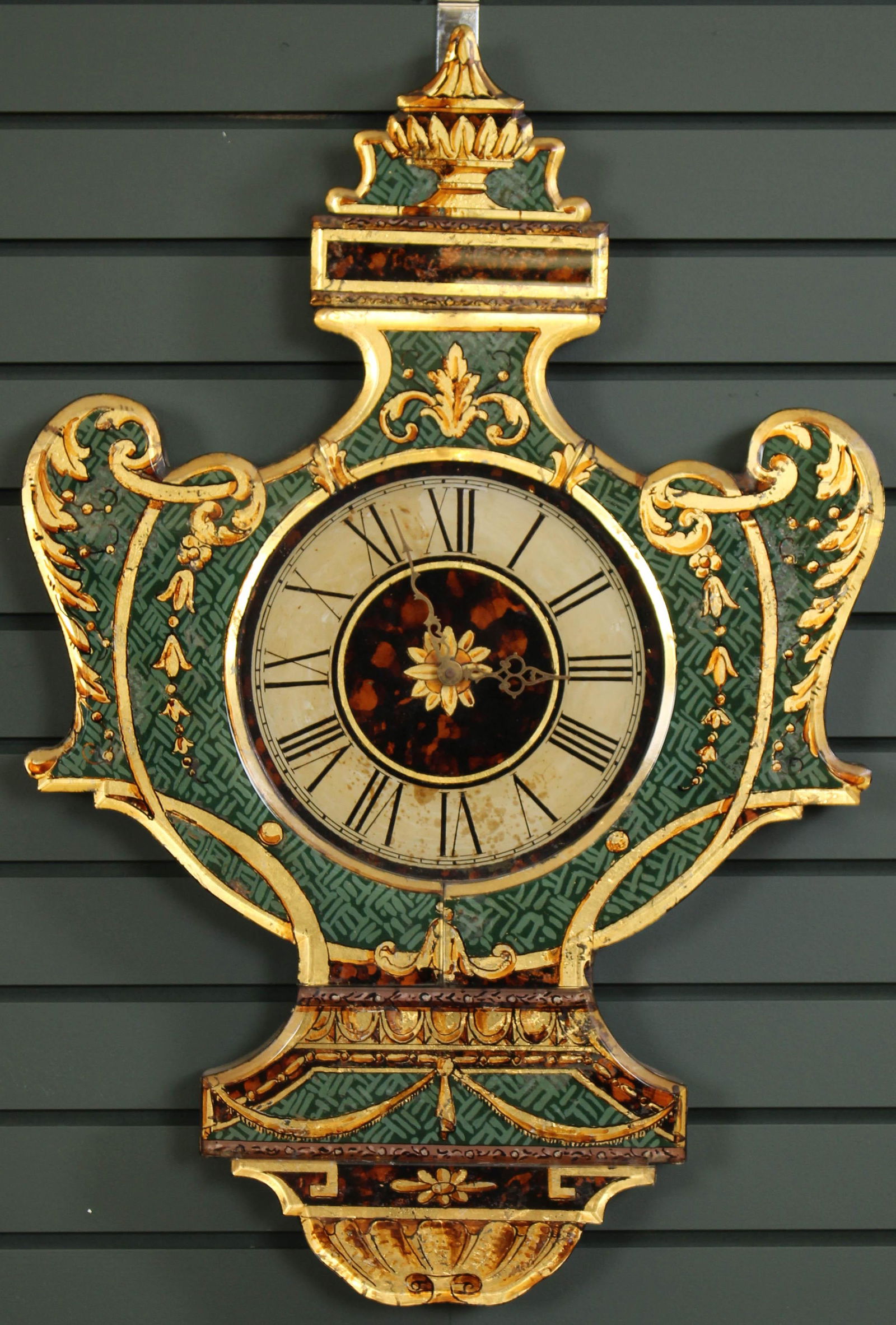 Neoclassical Eglomise Glass Urn Form Clock: Neoclassical Eglomise Glass Urn Form Clock, marked on works case Kienzle Germany. Size: 30"H x 20"W x 2"D