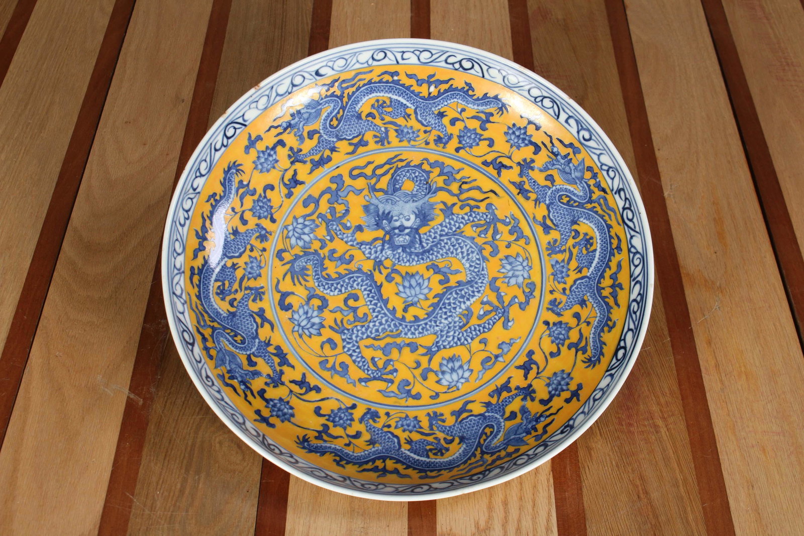 Kangxi Yellow Ground Dragon Bowl: Kangxi Yellow Ground Dragon Bowl. Size: 2.25" H x 12.5" Diameter.