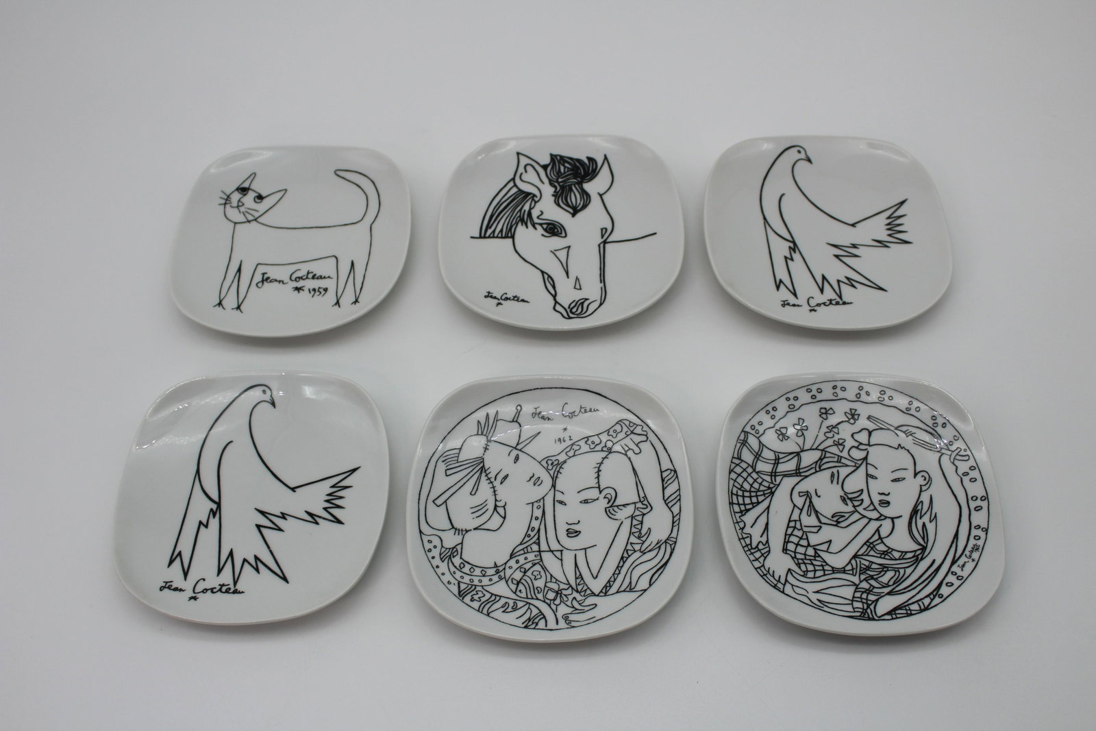 Set of 6 Jean Cocteau for Promo-Ceram Side Plates: Set of 6 Jean Cocteau for Promo-Ceram Side Plates, includes two birds, one horse, one cat dated 1959, and two figural plates, both dated 1962, each hallmarked on bottom Promo-Ceram Editions D' Art dec