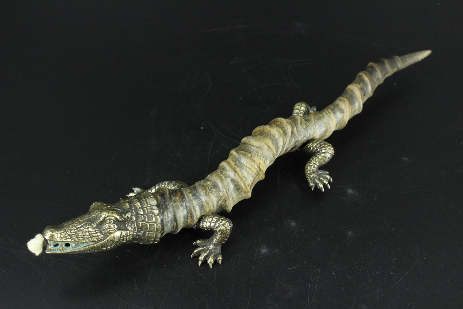 Alligator Form Antelope Horn Table Cigar Lighter: Alligator Form Table Cigar Lighter. Blackbuck antelope horn body with mountings. Size: 2.5"H x 15.5"W x 4"D