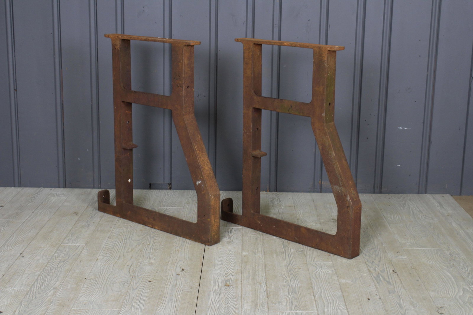 Pair of Early 20th C. Industrial Cast Iron Bases: A pair of early 20th century industrial cast iron table or machine bases. Great for a large console or table. 32 1/2" x 28" x 2 1/2"