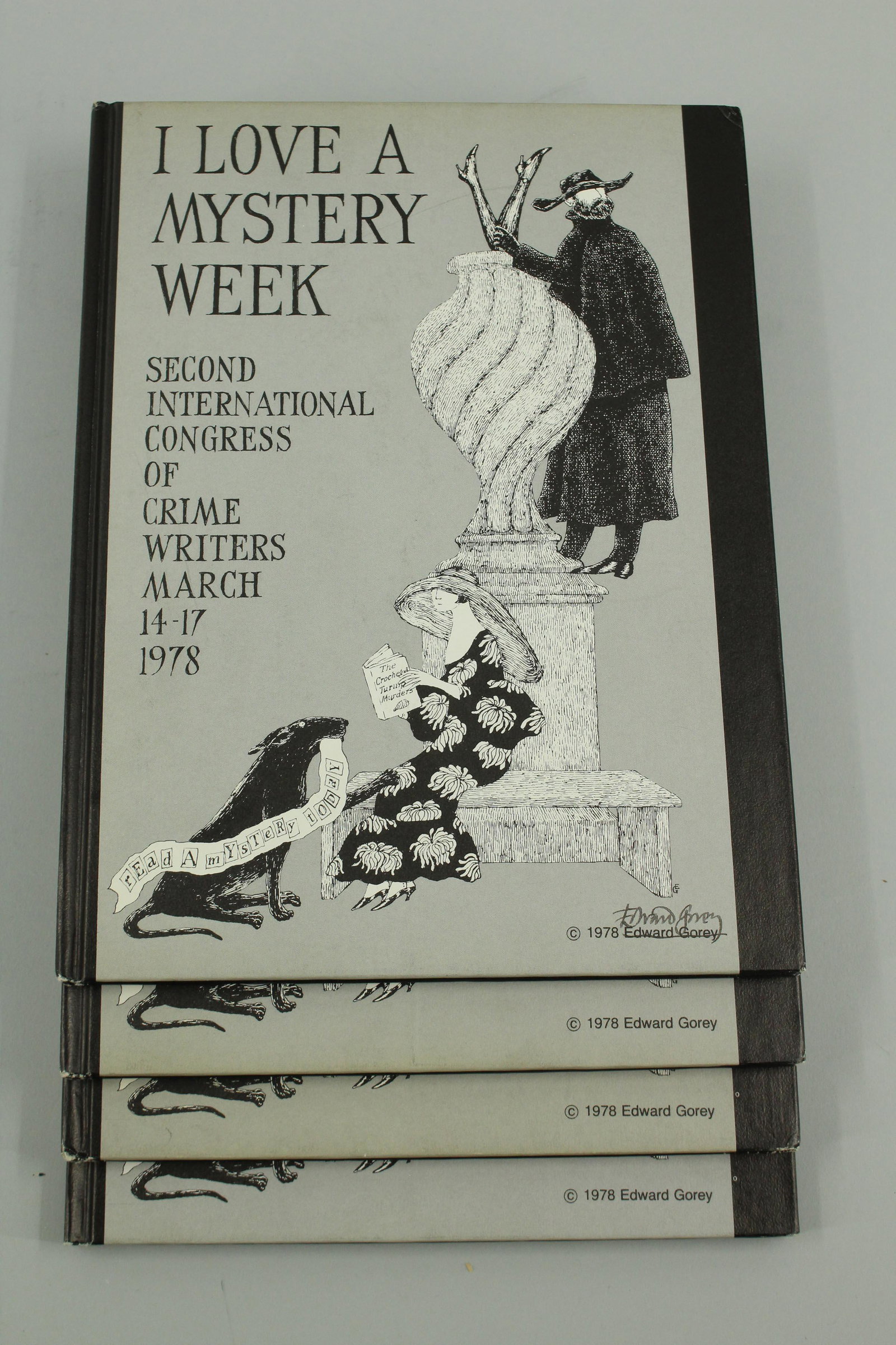 4 Copies of I Love a Mystery Week with Gorey Cover: 4 copies of "I Love a Mystery Week" with Gorey cover. From Second International Congress of Crime Writers March 14-17, 1978, here are four copies of "I Love a Mystery Week" of 800 printed. With a tast