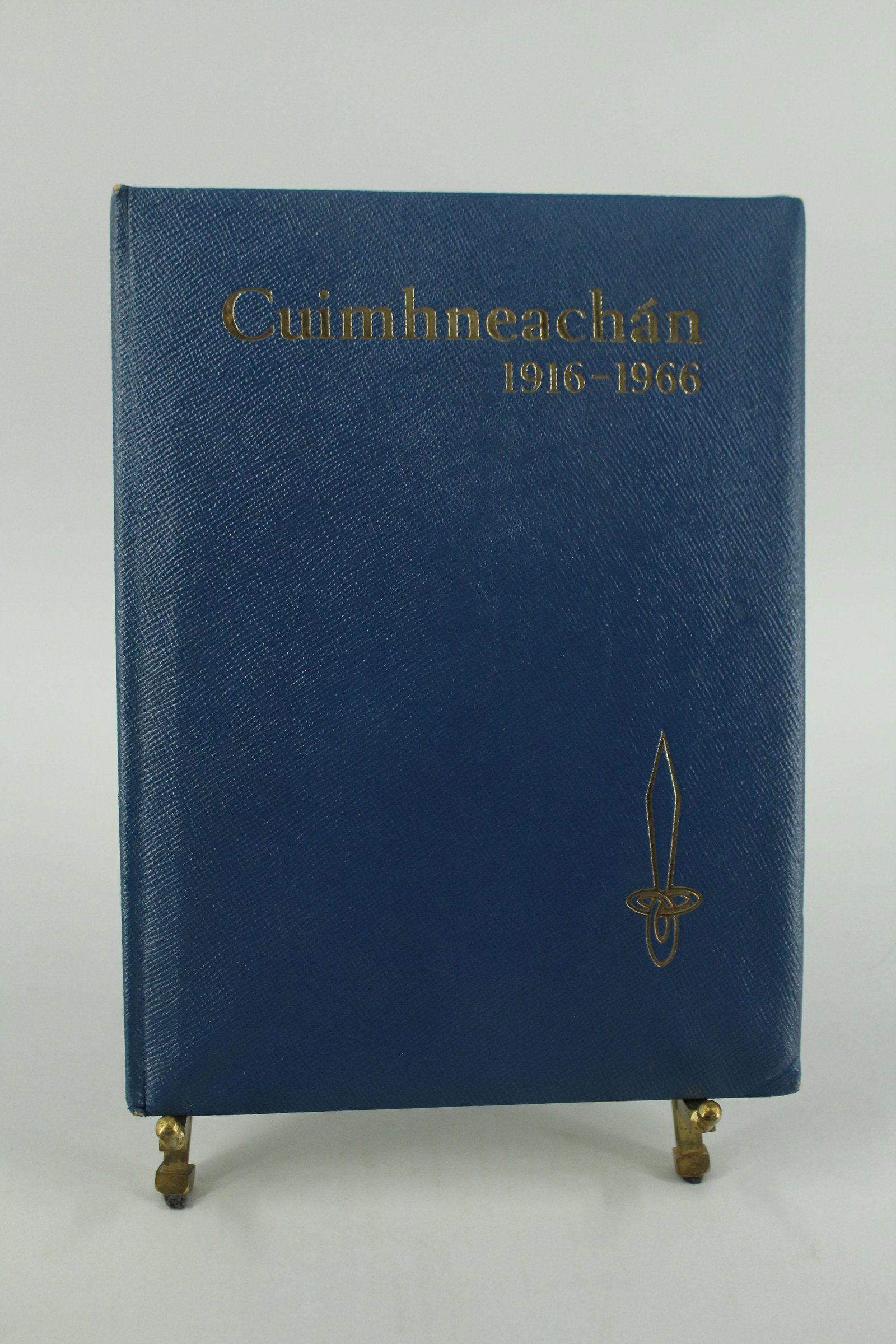 Signed and Inscribed Irish Heritage Yearbook: Cuimhneachan 1916-1966. Inscribed in thanks to Padraic Colum and signed by the Taoiseach (president) Eamon de Valera, 1966. Signatures of other Irish dignitaries.