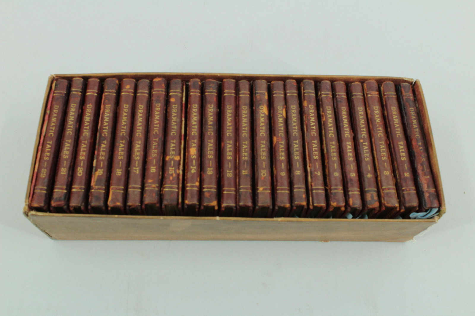 Dramatic Tales 22 Vol Colored Plates: Boxed set of 22 volumes of "Dramatic Tales" published by John Duncombe and Co, London, colored plates by Findlay. No publication dates, 1831-36. Red leather, loose and repaired boards to many of the 2