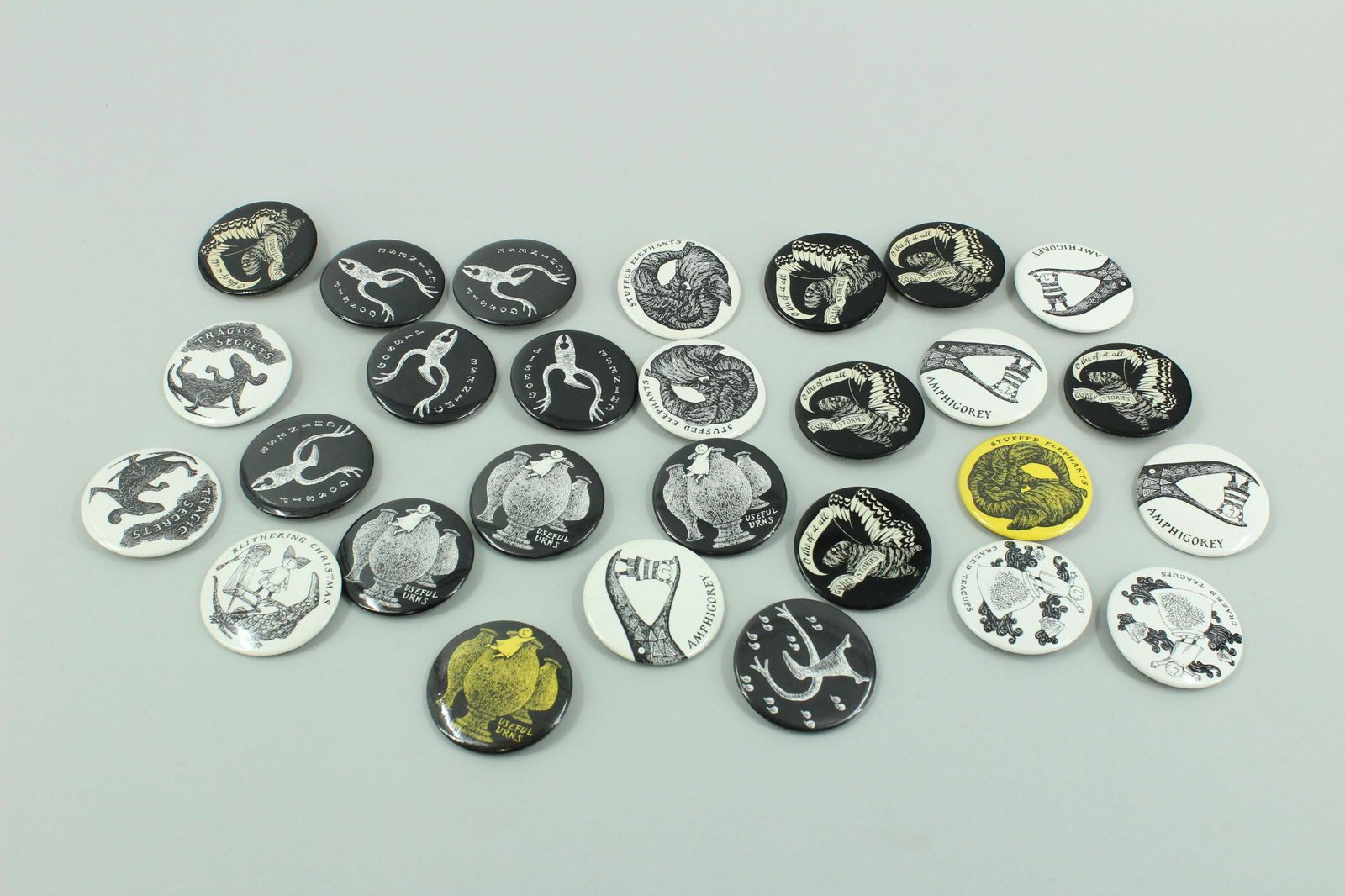 28 Various Edward Gorey Illustrated Buttons (1 of 9)