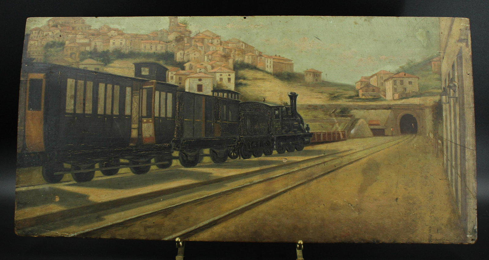 Continental Locomotive Painting: Continental Locomotive Painting. Seemingly in a Tuscan countryside. Artist unidentified. Inscribed in pencil on obverse "Ralph Carbone" Size: 12.75" x 25.75" board.