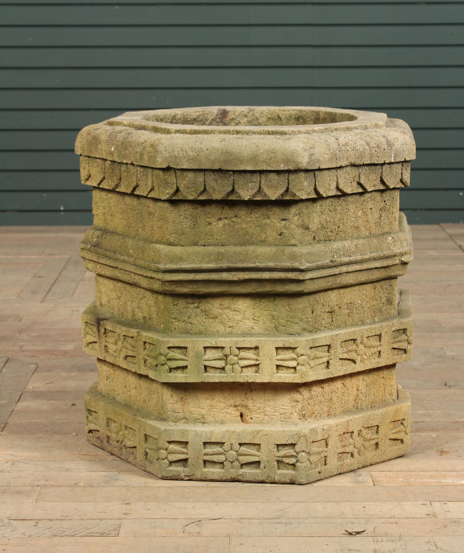 Carved Stone Octagonal Wellhead: A carved stone octagonal well head with border decoration. Size:24"H x 24"Dia.