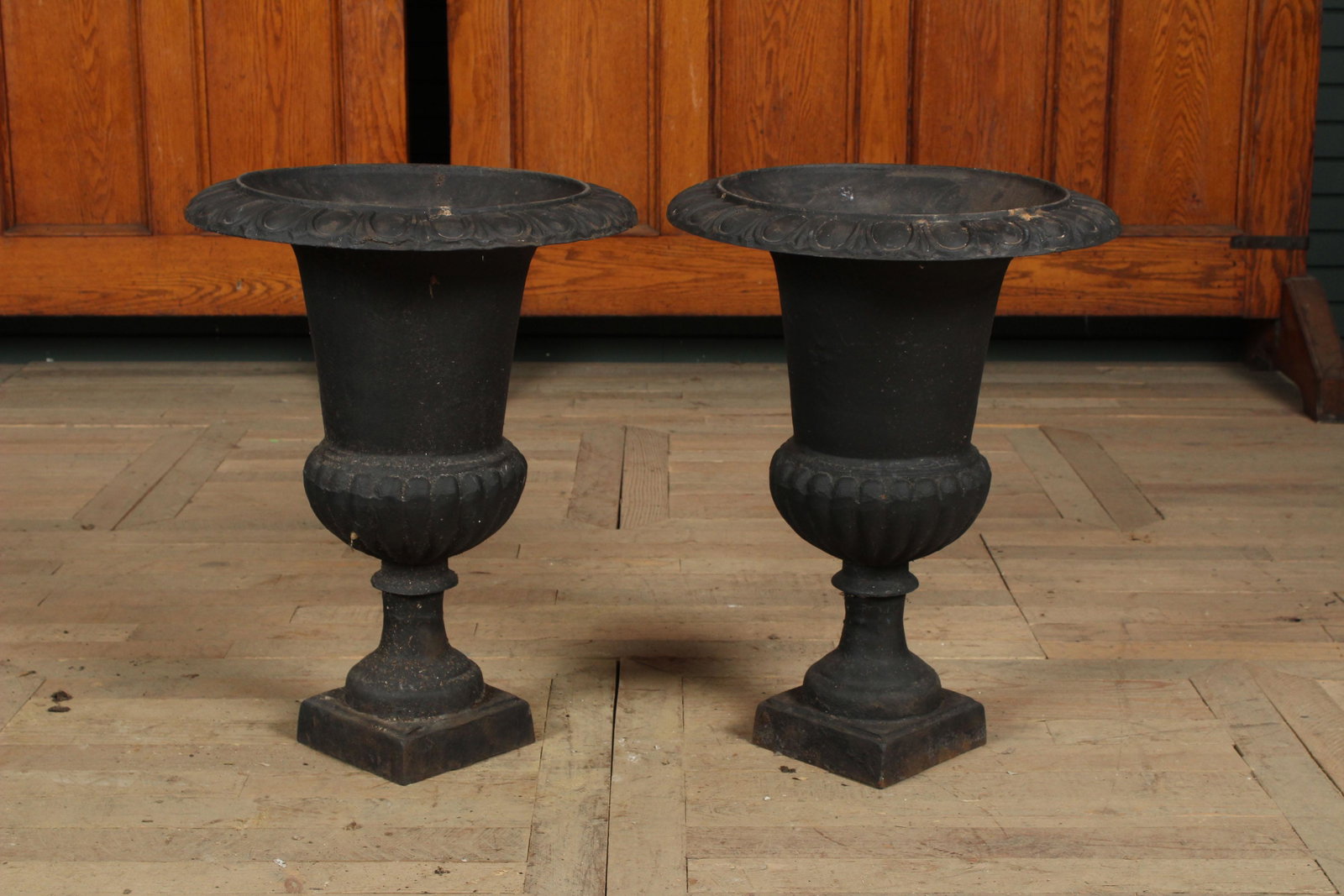 Pair Cast Iron Campana Form Garden Urns: A good pair of campana form cast iron garden urns.Size: 24" H x 18" diameter.