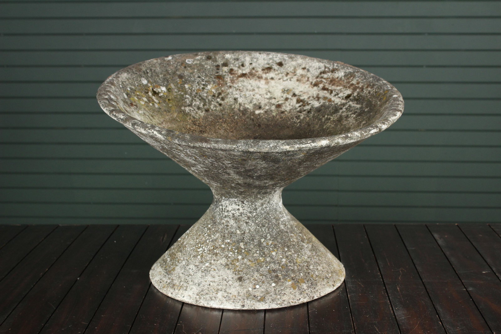Willy Guhl Canted Hourglass Planter: A good Willy Guhl canted hourglass garden planter. Size: 18.5" H x 24" diameter.
