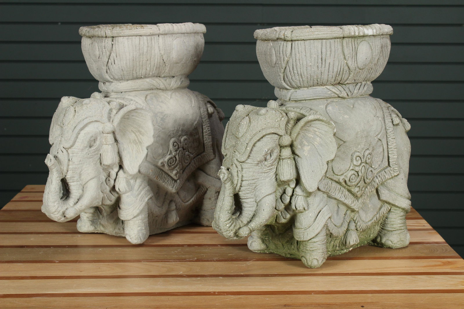 Pair Cast Stone Elephant Form Planters: A whimsical pair cast stone elephant garden planters/ urns each having basket on their heads. Size: 16"H x 12"W x 7.5"D