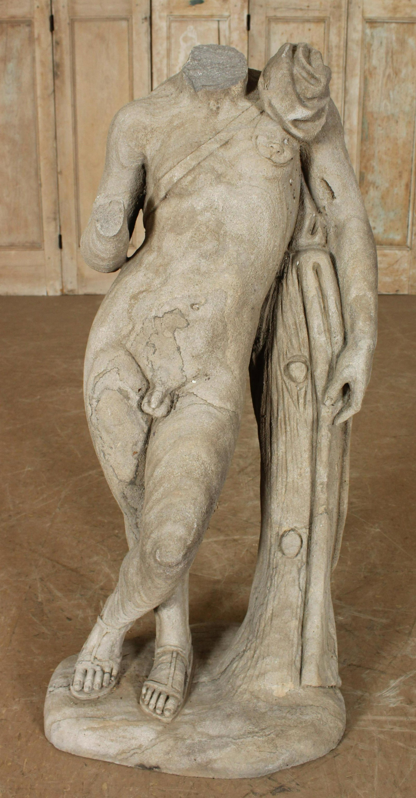 Neoclassical Fragmented Carved Stone Figure: Neoclassical Fragmented Carved Stone Figure with draped tunic. Size: 44.5" H x 21.5" W x 14.5" D