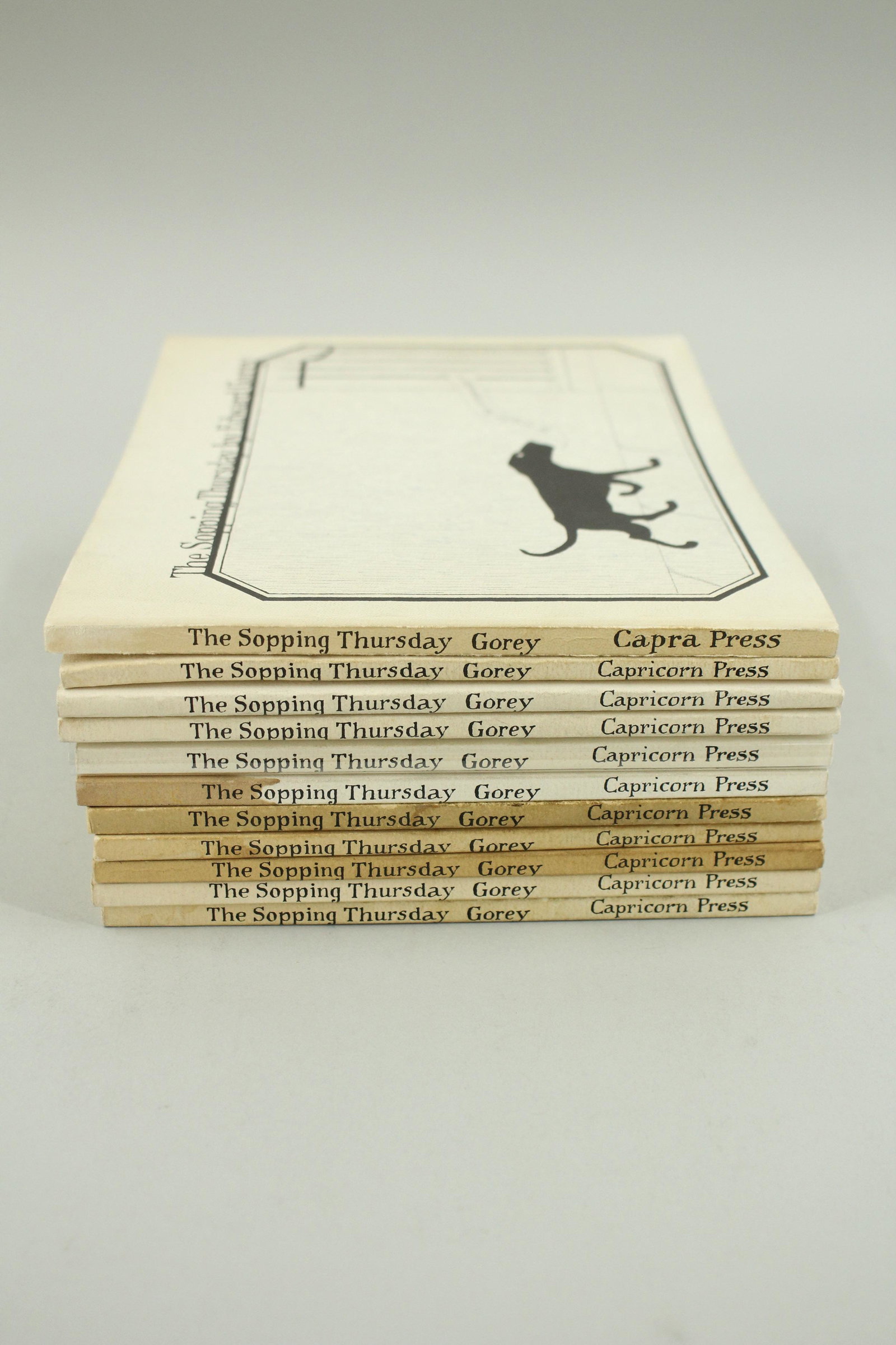The Sopping Thursday by Edward Gorey, 11 Copies: Eleven copies of "The Sopping Thursday" by Edward Gorey, Capricorn Press 1971, 4 are signed, 7 are not signed. All are second printings. 2 of the signed copies are VG, 2 have tanned covers. 2 of the u
