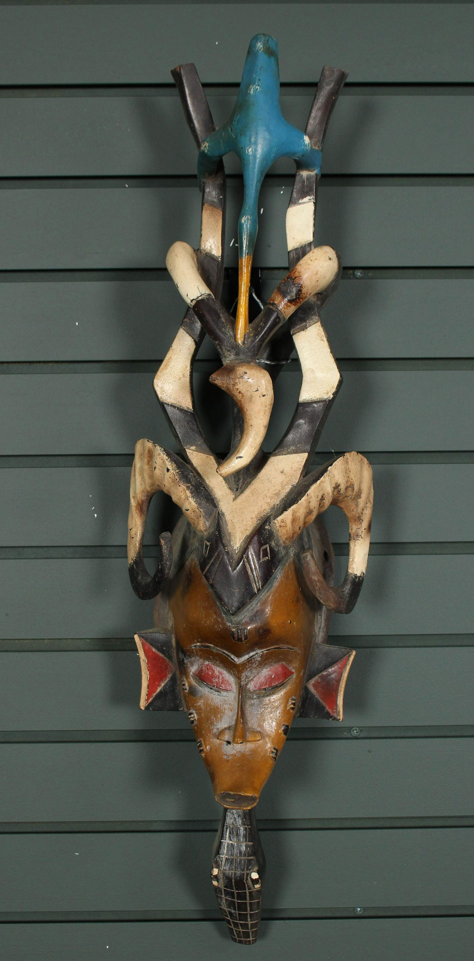 African Guro Mask: African Guro Mask. Carved and painted wood. Size: 28" x 8" x 6"