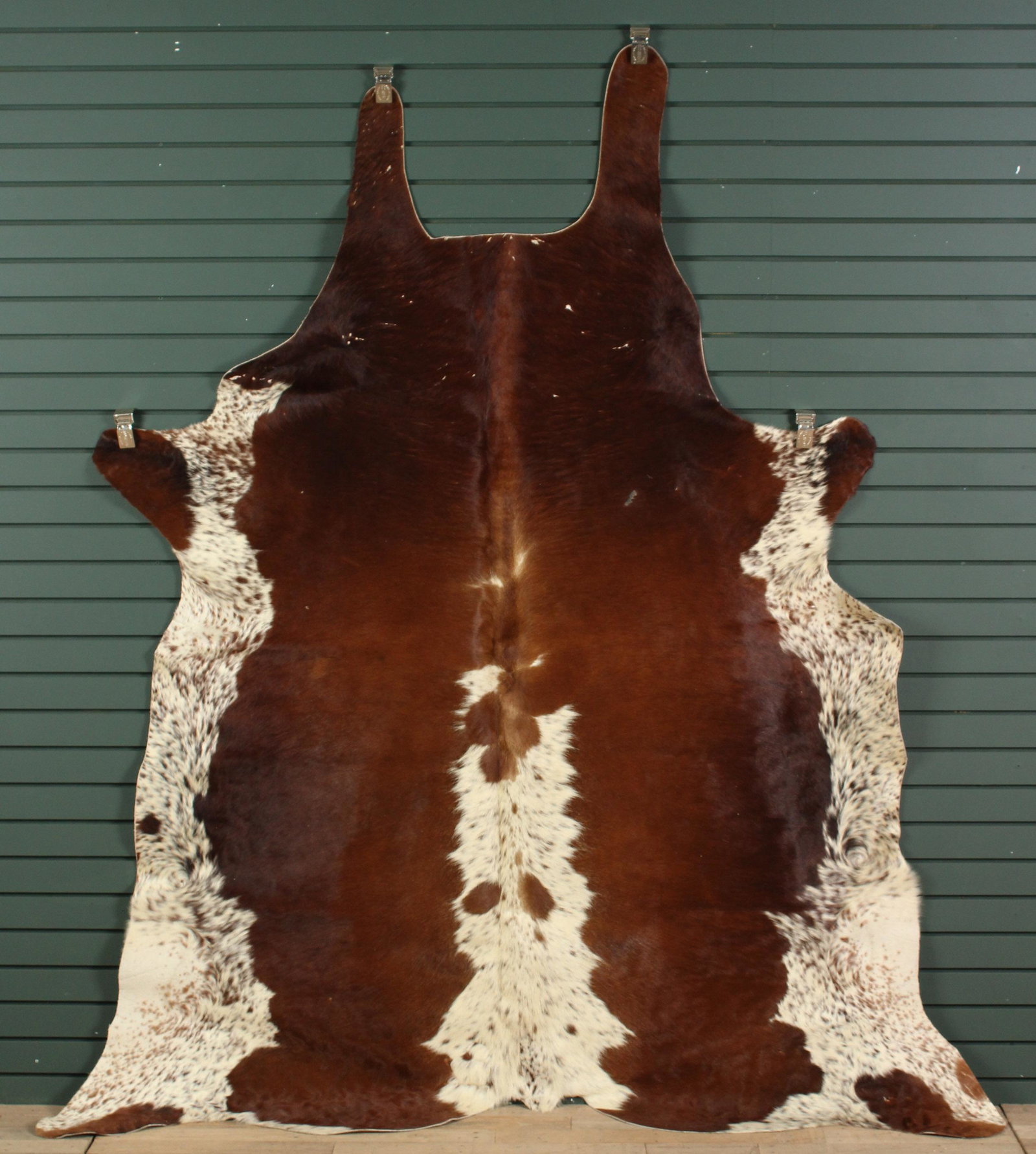 Cowhide: Cowhide. Size: 91" H x 77" W