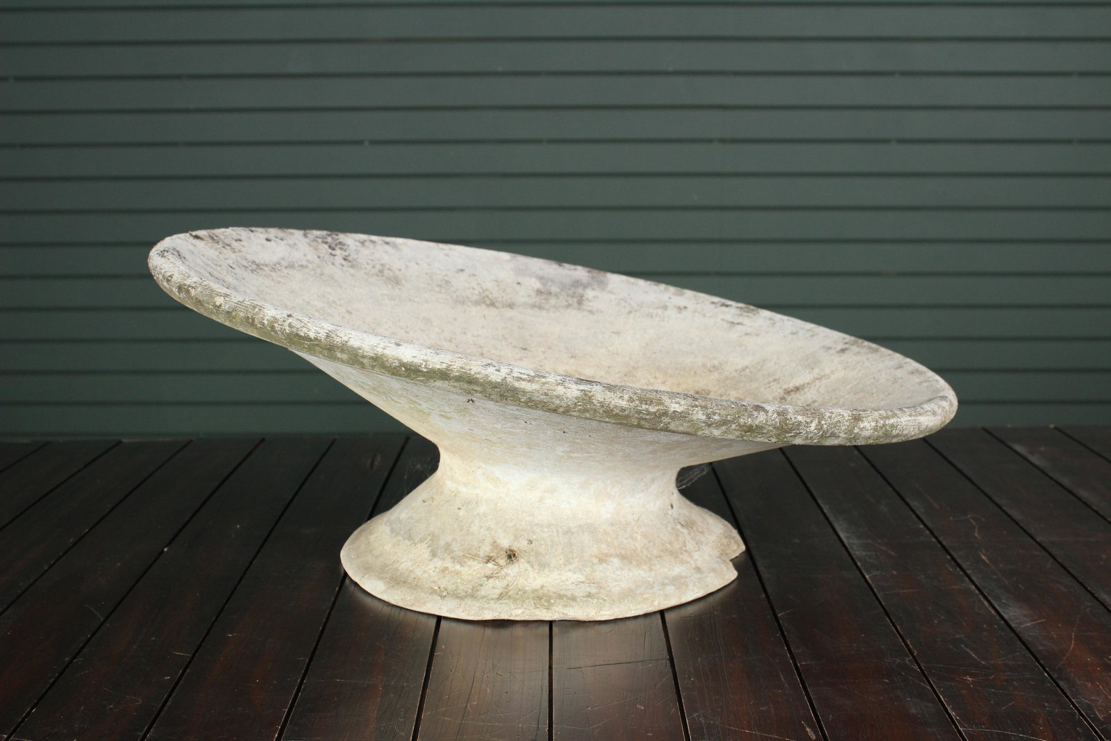 Willy Guhl Canted Hourglass Planter: Willy Guhl Canted Hourglass Planter. An interesting Willy Guhl squat and canted garden planter. Size: 10.5" H x 25" diameter.