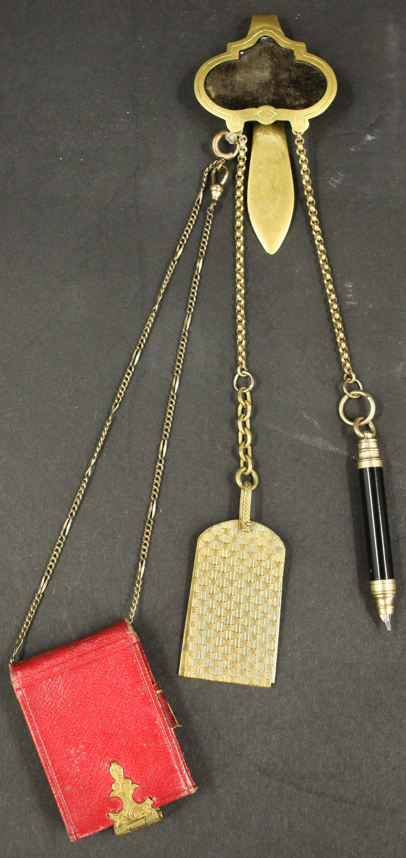 Louisa May Alcott Chatelaine: Louisa May Alcott Chatelaine. Size: 10.5" L x 2" W Provenance: Production of â€œDickinson”