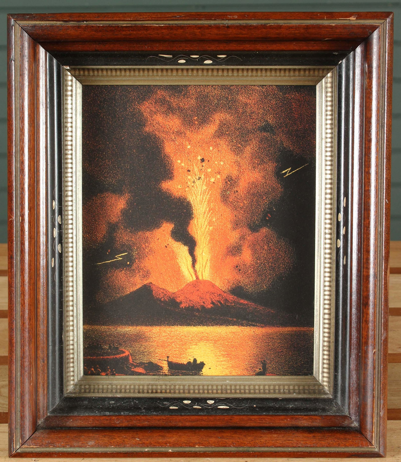 Volcano Lecture Graphic in Easel Frame: Volcano Lecture Graphic in Easel Frame. Studio-made. Size: Frame: 14" H x 12" W x 3" D; Sight: 9.5" H x 7.5" W Provenance: Production of â€œDickinson”