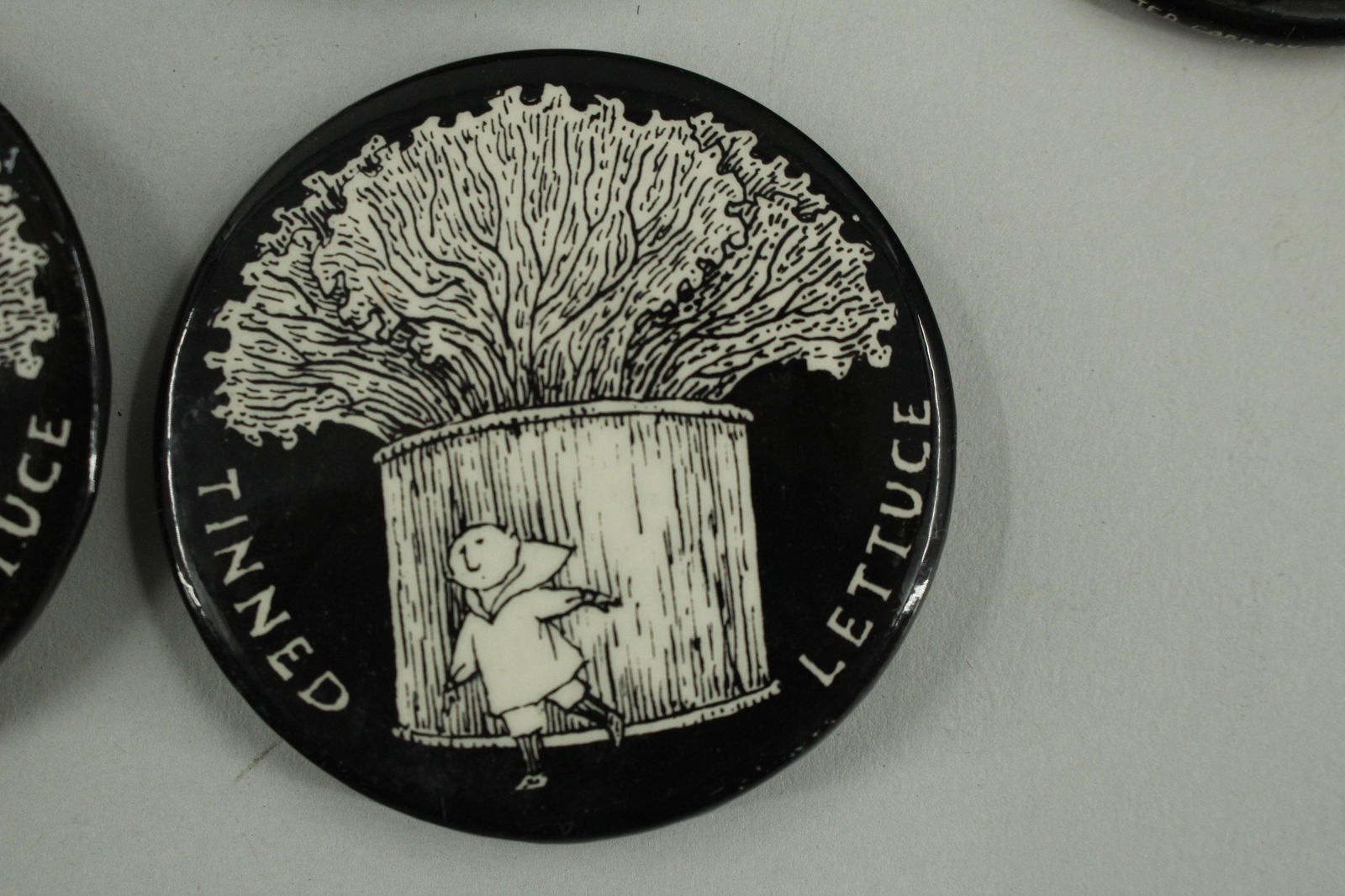 23 Tinned Lettuce Buttons by Edward Gorey (1 of 6)