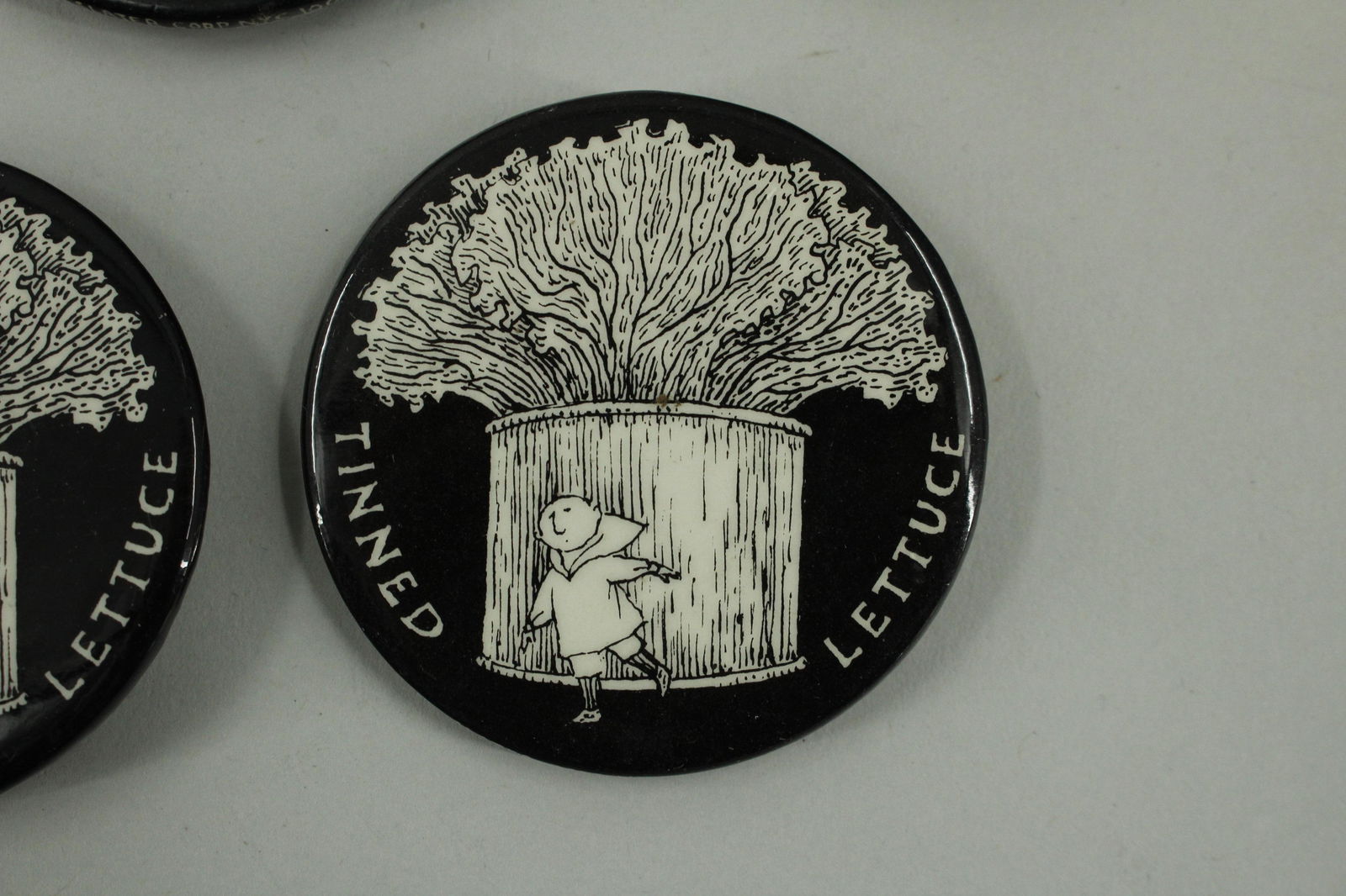 27 Tinned Lettuce Buttons by Edward Gorey (1 of 5)