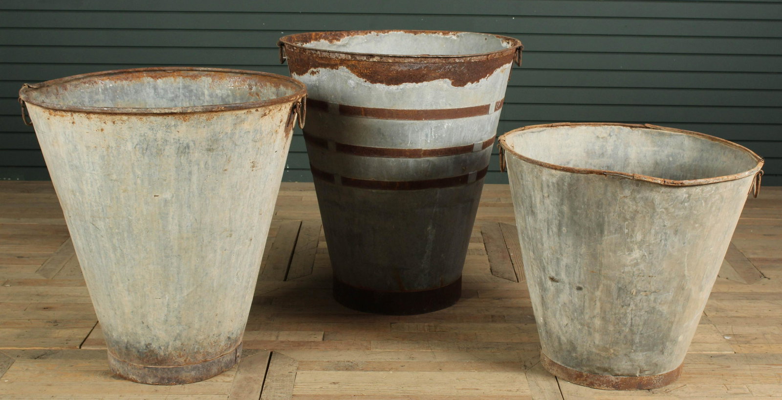 Group of 3 Harvest Hods: A lot of three zinc harvest hods or garden planters and containers. Size: Largest: 32" H x 29.5" W x 29.5" D
