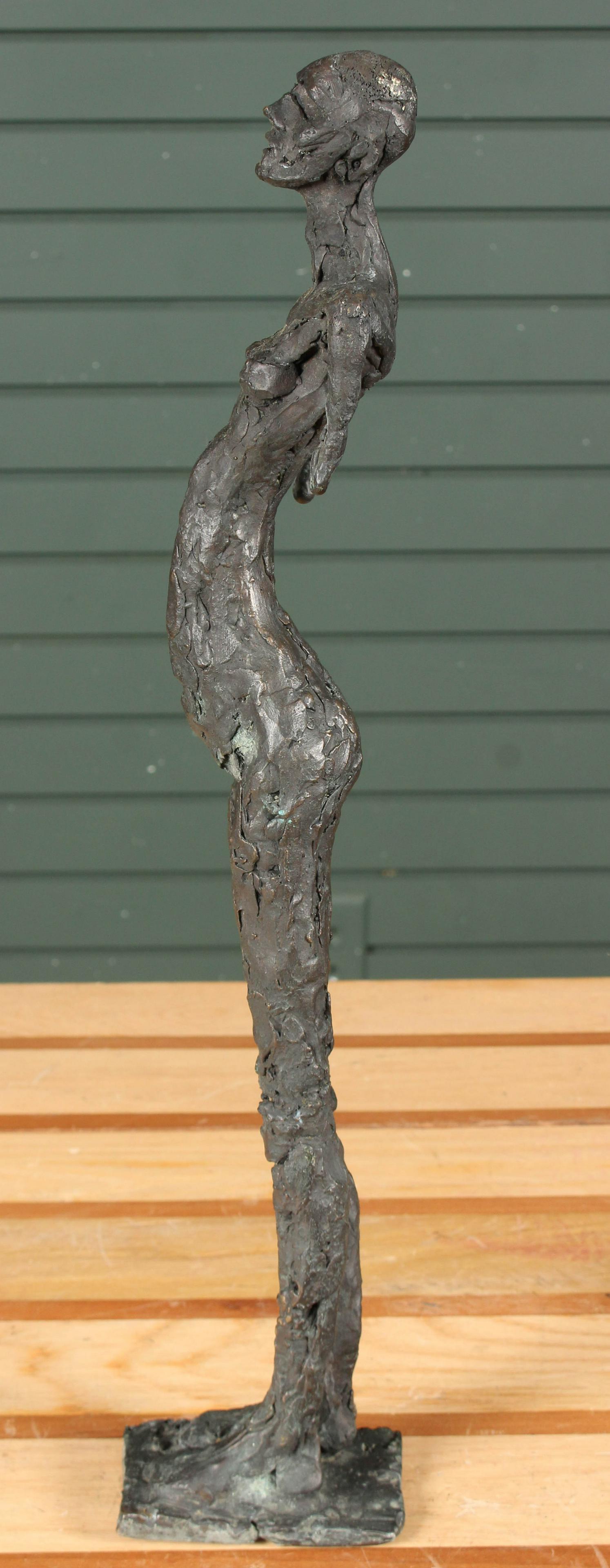 Giacometti Inspired Figural Bronze Sculpture: Giacometti Inspired Bronze Sculpture. Size: 20" H x 4" W x 4" D