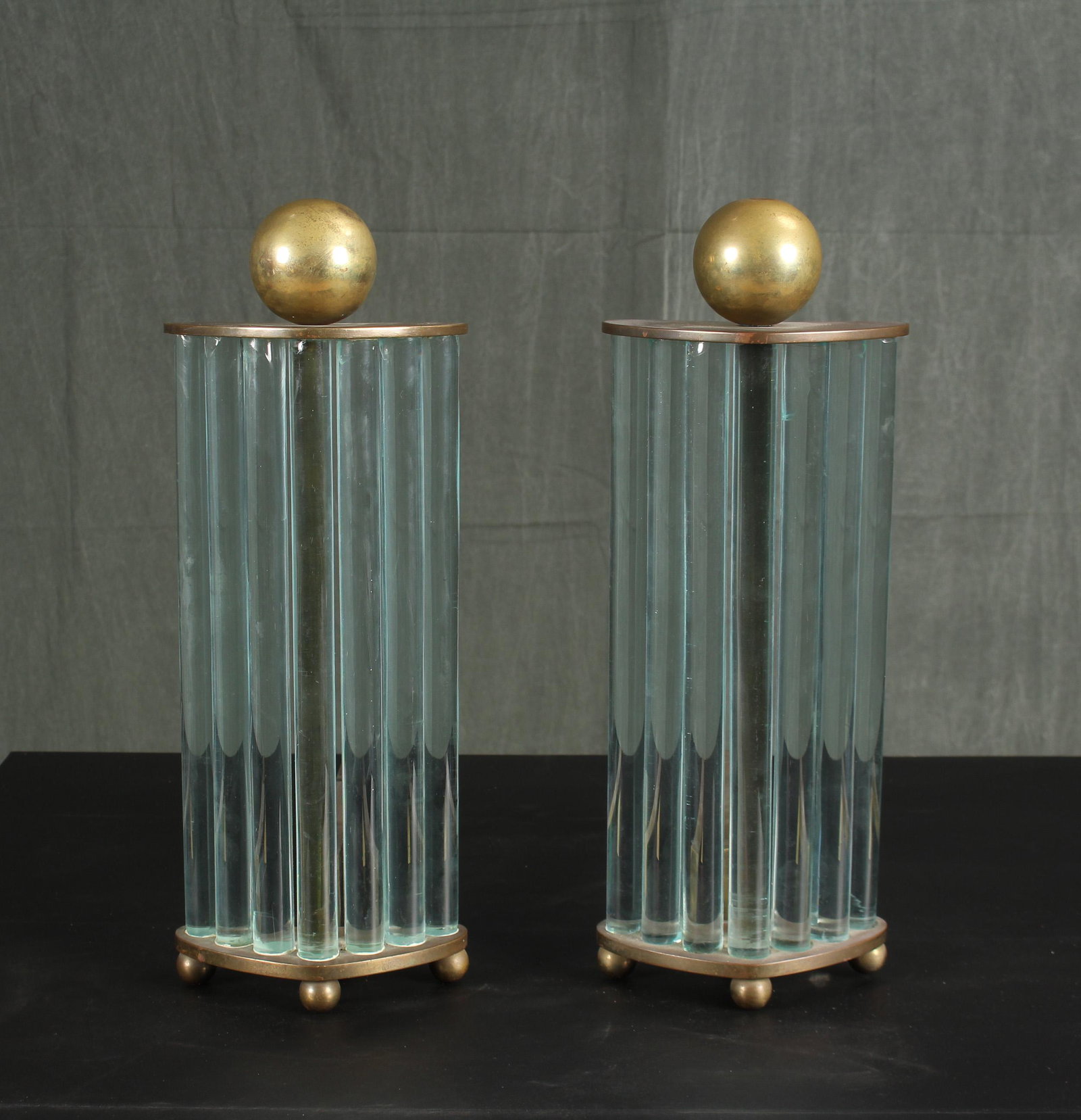 New York Maker Art Deco Glass Rod Andirons: A very good pair of Art Deco bronze and glass rod andirons labeled William H. Jackson Company New York. Size: 19"H x 7.5"W x 13"D