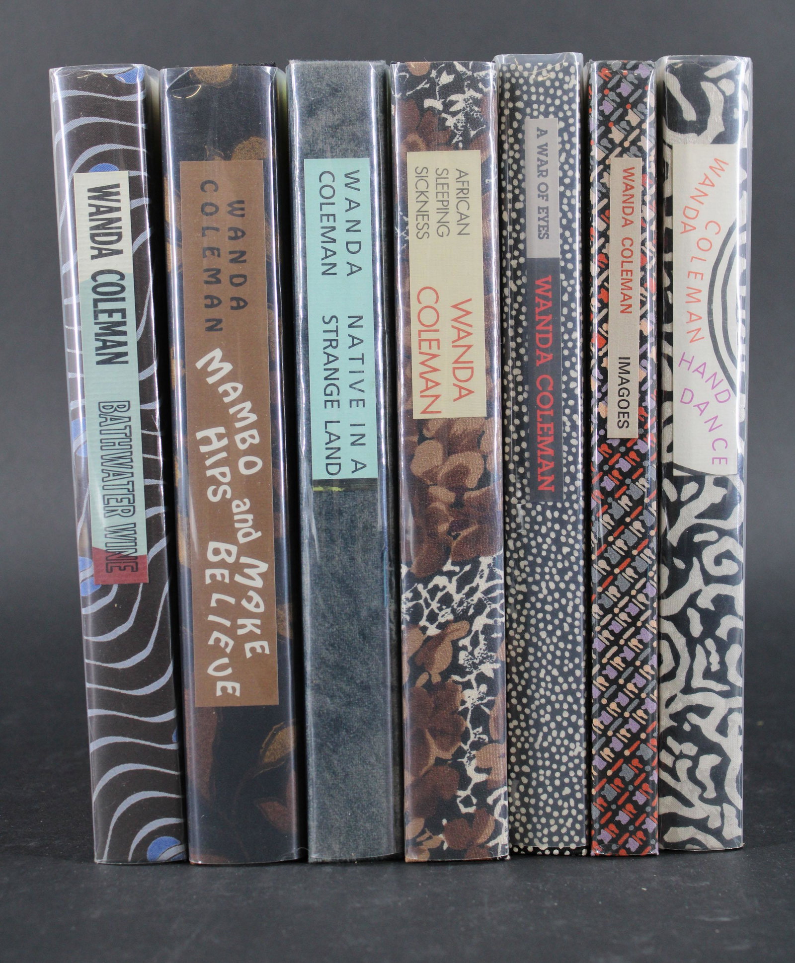 7 Signed Black Sparrow Press Books - Wanda Coleman: Seven signed and lettered books bound by Earle Gray from the African-American writer Wanda Coleman published by Black Sparrow Press, including two with original drawings: Mambo Hips and Make Believe, 