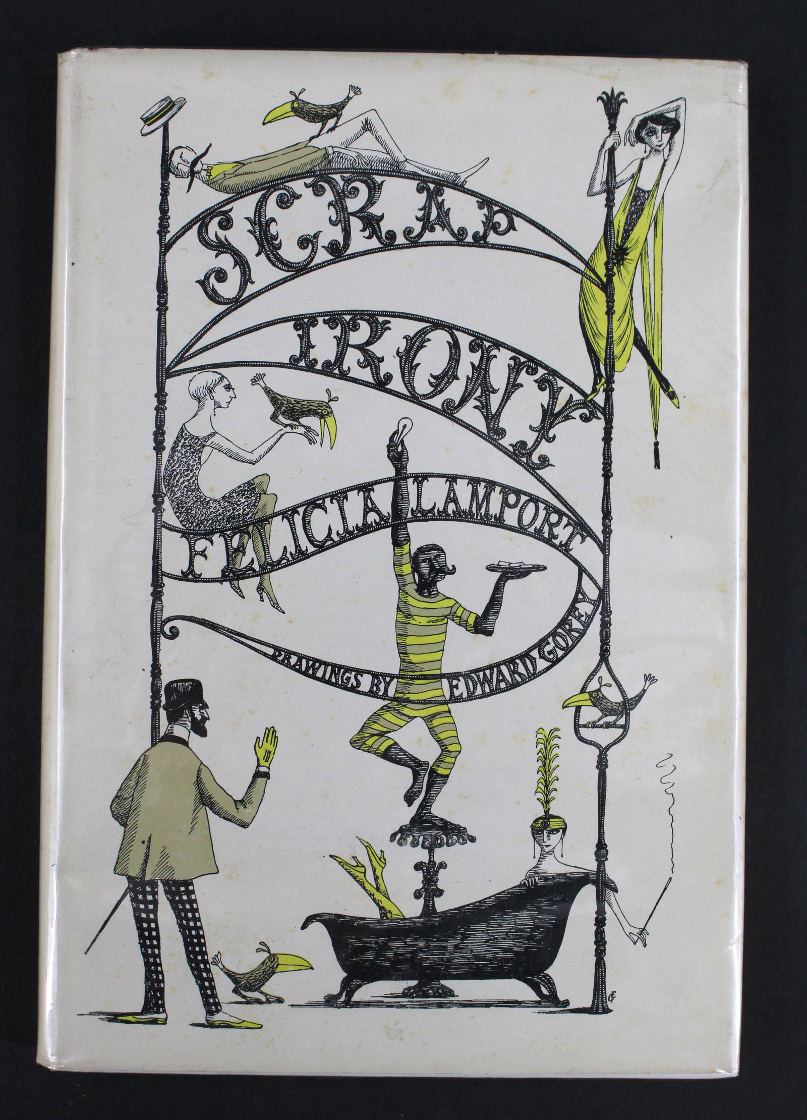 Scrap Irony, Drawings by Edward Gorey, Signed: Scrap Irony by Felicia Lamport, Drawings by Edward Gorey. 3rd Printing. Signed by EG. Hardcover, dust jacket. Size: 8.25" x 5.5"