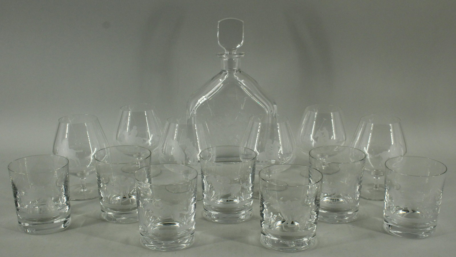 Etched Glass Horse Theme Decanter and Glassware: Etched Glass Horse Theme Decanter and Glassware. Size: Largest: 11" H x 6.5" W x 2.5" D