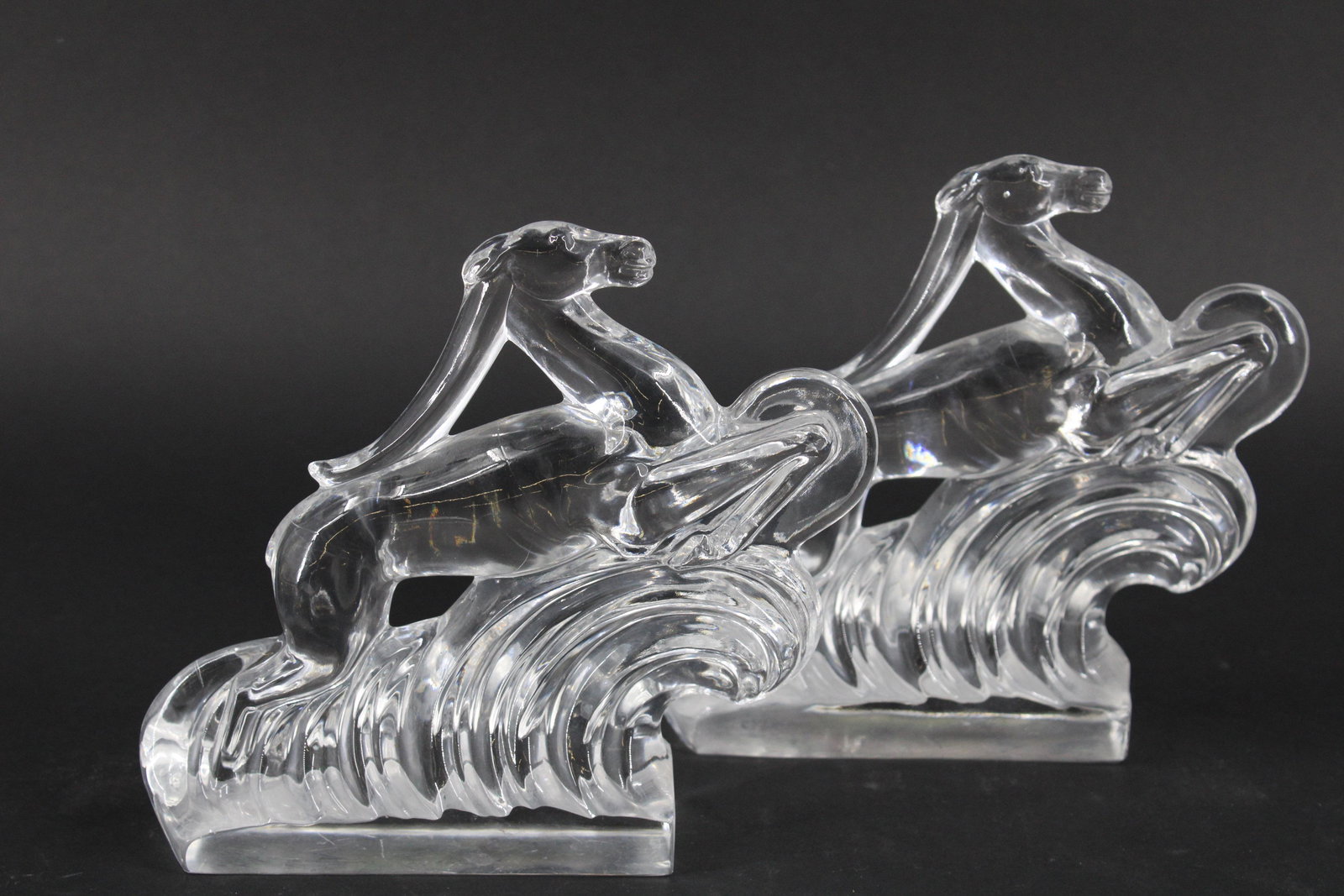 Pair of Steuben Gazelle Bookends: Pair of Steuben Gazelle Bookends. Size: 6.5"H x 8"W x 2"D