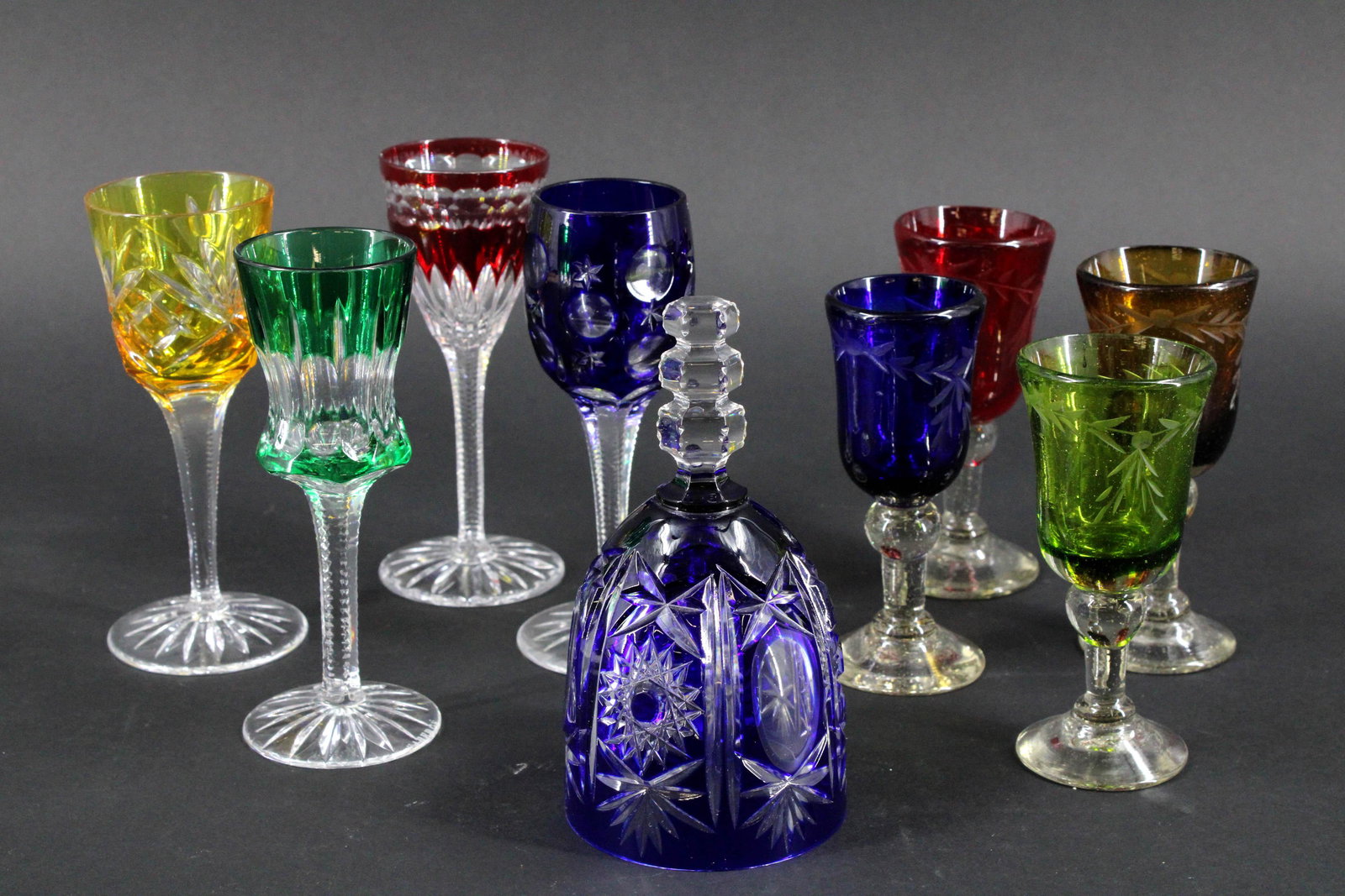 Group of Cased and Colored Glass: Group of colored glass including Faberge. Size: 6"H x 2.25"D