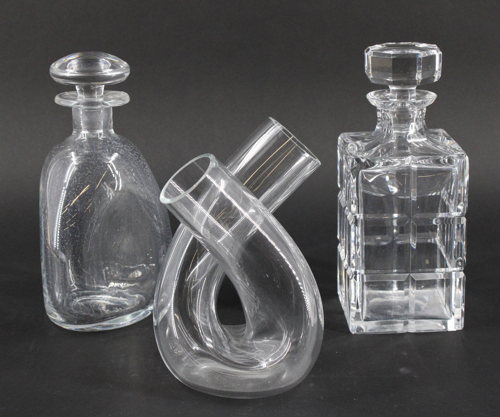3 Decanters: Three Decanters. Size: 9"H x 3.5"W x 3.5"D