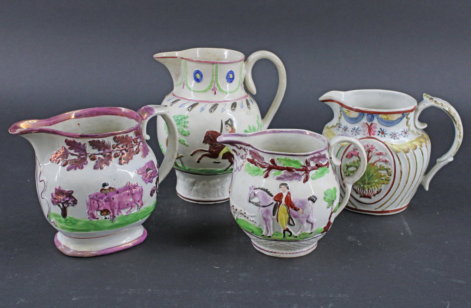 Group of 4 Antique Lusterware Creamers: Group of 4 Antique Lusterware Creamers. Size: tallest 6"H x 6"W x 4.5"D