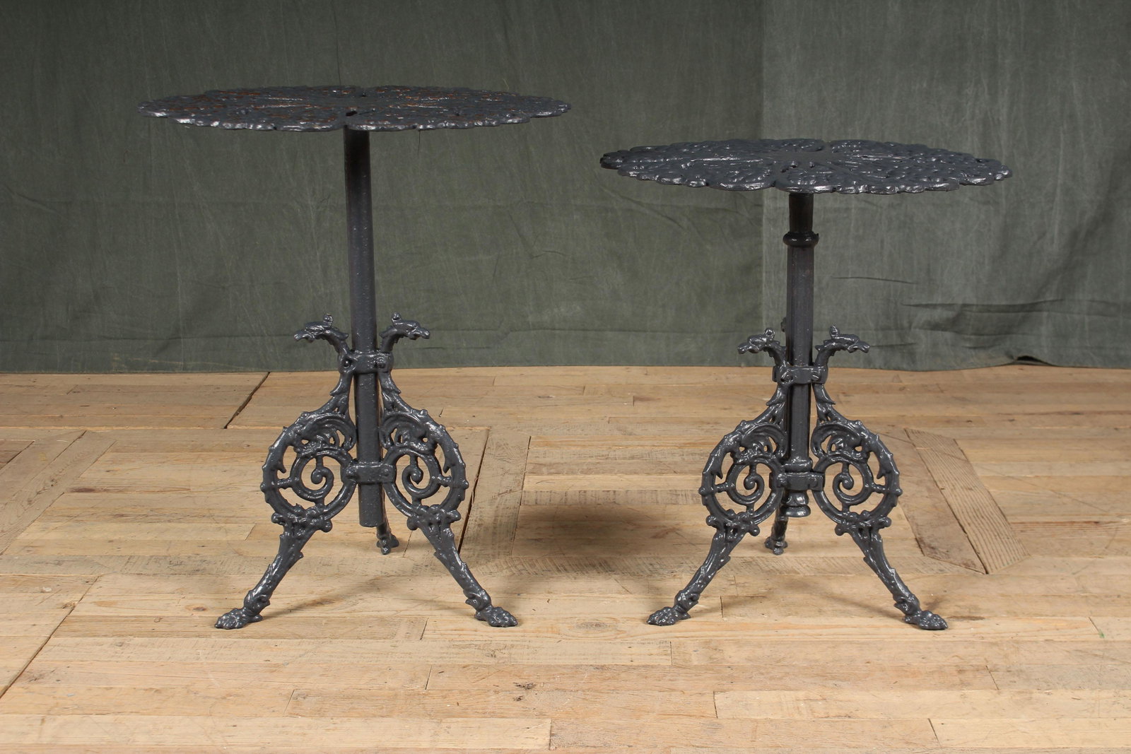 Pair Cast Iron Griffin Motif Drinks Table: Pair Cast Iron Griffin Motif Drinks Table. Size: Taller, 27" H x 22" Diameter