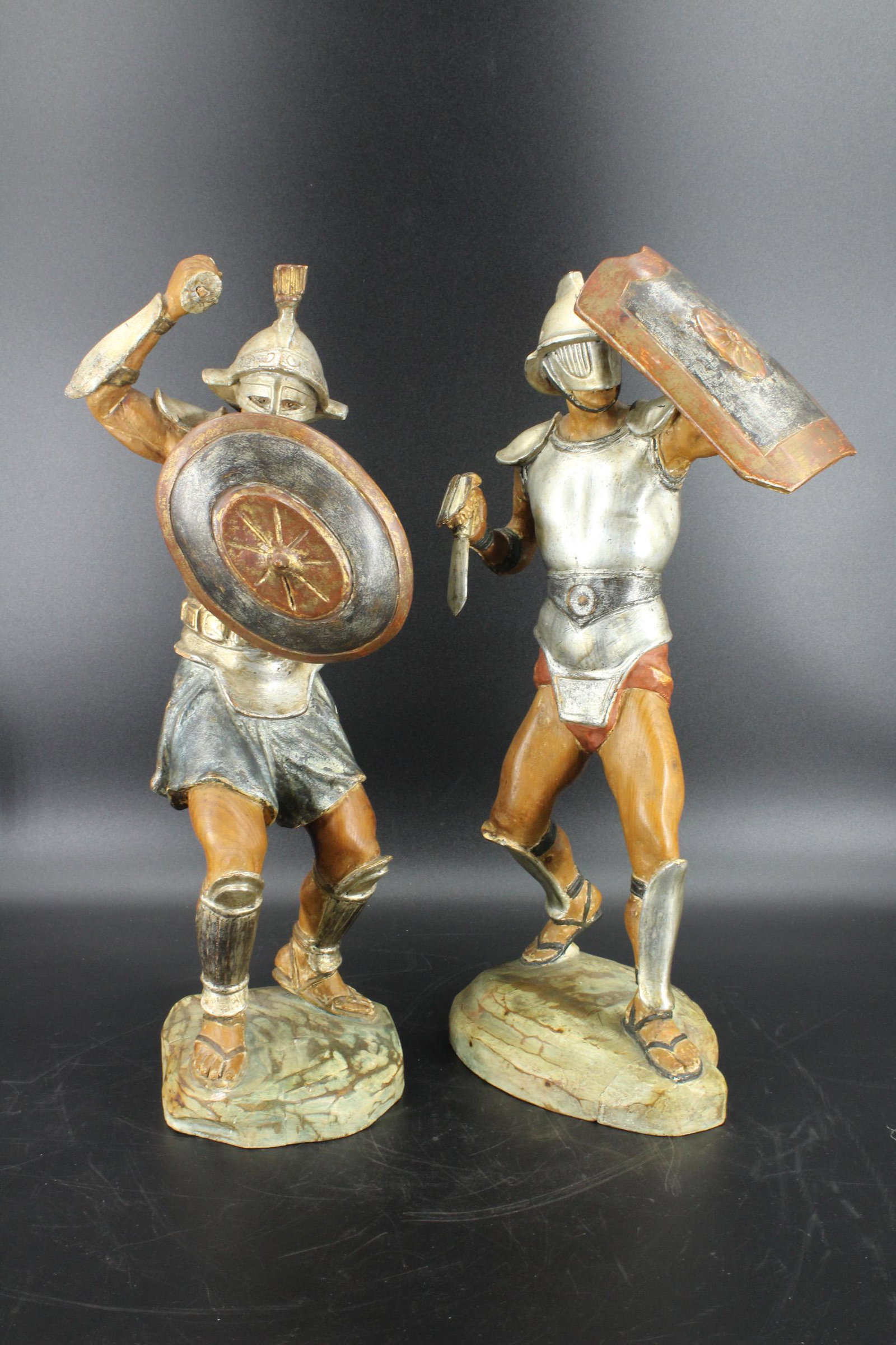 Italian Figural Carved Wood Gladiators: Italian Carved Wood Gladiators. Size: 21"H x 10"W 9"D, 21"H x 9"W x 6"D