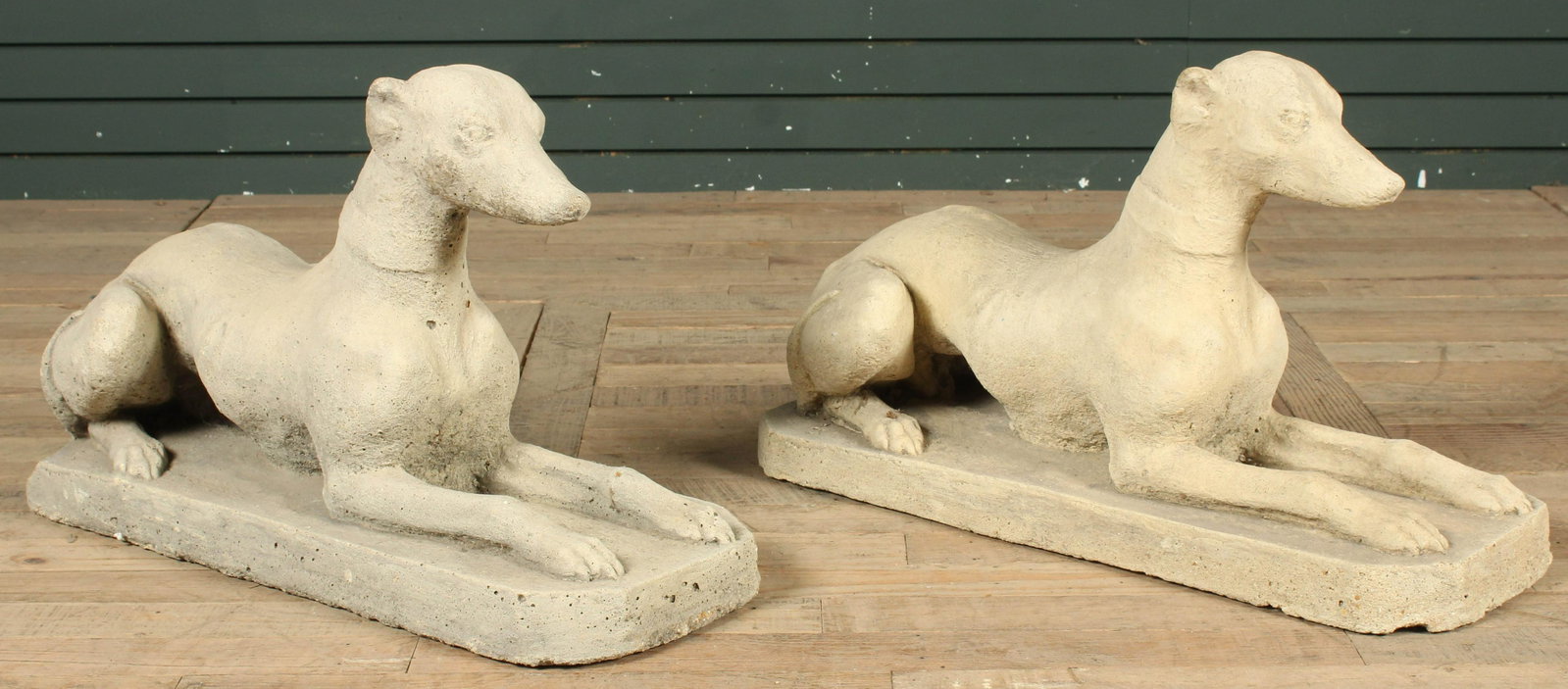 Pair Cast Stone Recumbent Whippets: Pair Cast Stone Recumbent Whippets. Size: 16.5" H x 10.5" W x 26" D