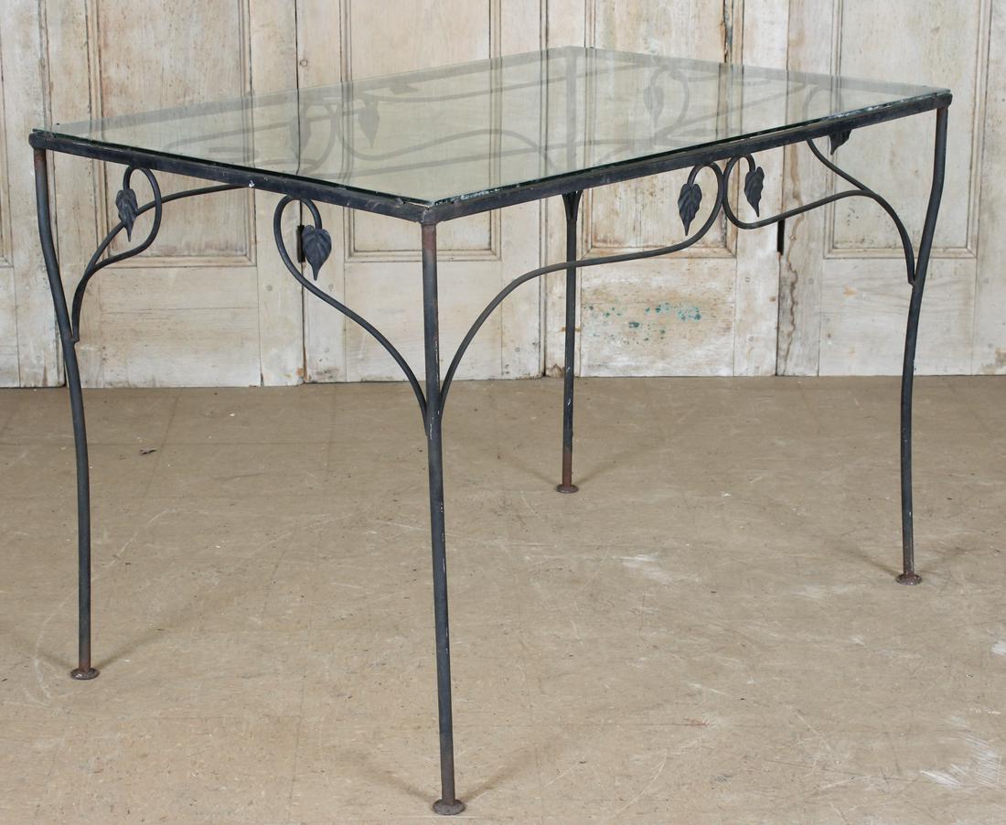 Wrought Iron Glass Top Vine Tendrils Table: Wrought Iron Glass Top Vine Tendrils Table. Size: 30" H x 42.5" W x 28.5" D (NHJ 68)