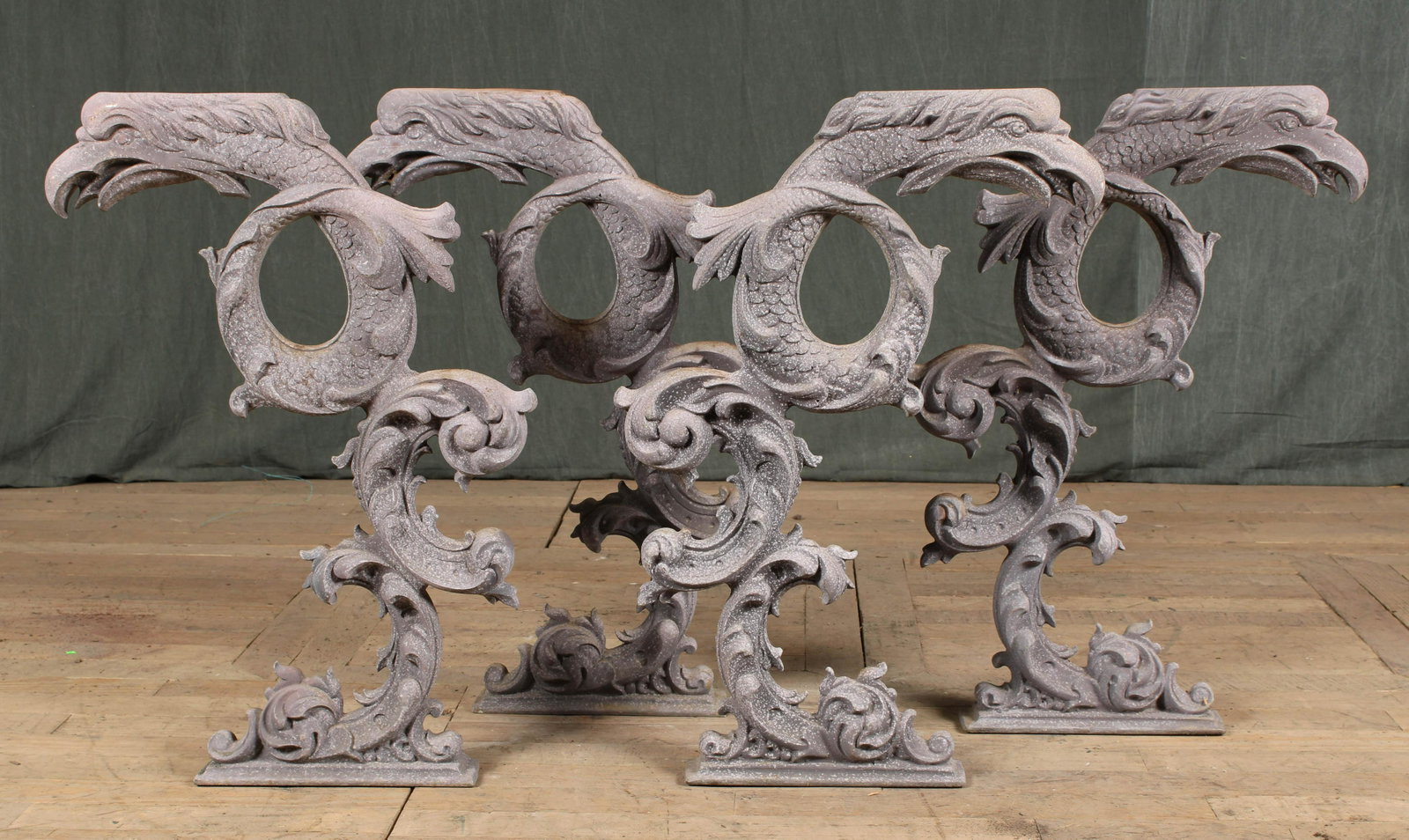 Cast Zinc Mythical Creatures Decoration: A very interesting set of four cast zinc mythological bird form serpents each having scale ad scroll decoration. Size: 30"H x 21"W