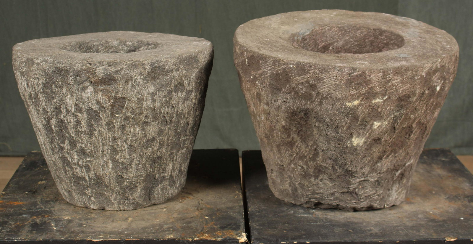 Pair Carved Lava Stone Garden Ornaments: A pair of carved stone garden urns possibly original crucibles or mortars. Size: 10"H x 14"Dia.