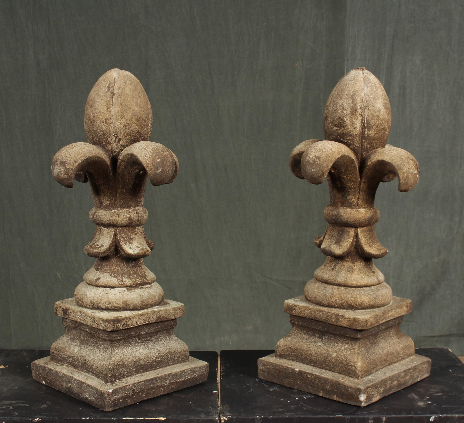 Pair Cast Stone Garden Finials: A pair of cast stone architectural Fleur de lis. Size: 24.5"H x 11"W x 11"D